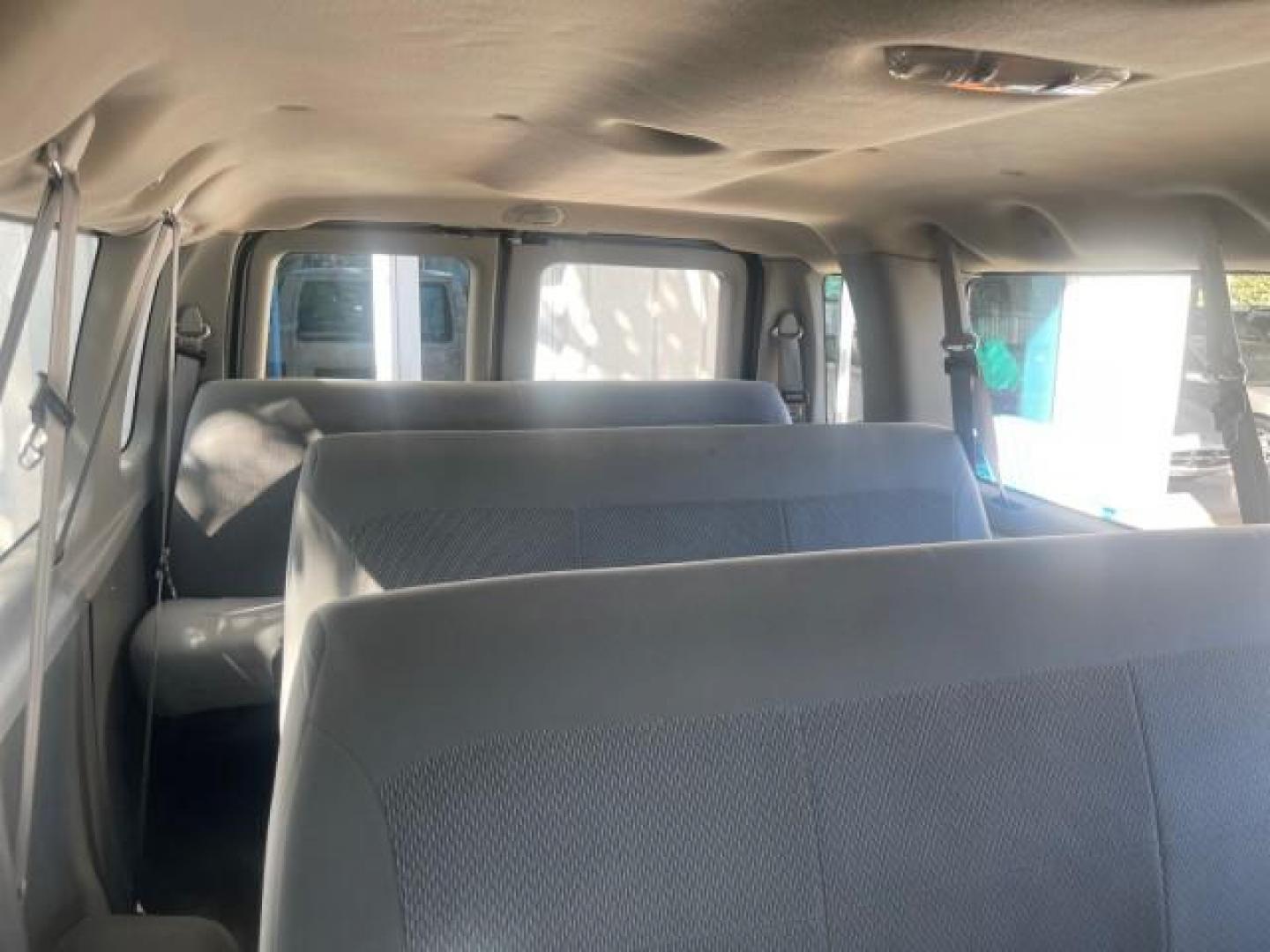 2006 Oxford White /Medium Flint Ford Econoline Wagon XLT LOW MILES 76,474 E350 15 PASS (1FBSS31L36H) with an 5.4L EFI V8 Engine engine, Automatic transmission, located at 4701 North Dixie Hwy, Pompano Beach, FL, 33064, (954) 422-2889, 26.240938, -80.123474 - OUR WEBPAGE FLORIDACARS1.COM HAS OVER 100 PHOTOS AND FREE CARFAX LINK 2006 FORD E-SERIES E-350 SD XLT 15 PASSENGER VAN NEW $29,805 VIN: 1FBSS31L36HA01462 1 F B S S 3 1 L 3 6 H A 0 1 4 6 2 VAN 5.4L V8 F GASOLINE REAR WHEEL DRIVE Features ABS Brakes Air Conditioning AM/FM Stereo Automatic Transmission - Photo#71