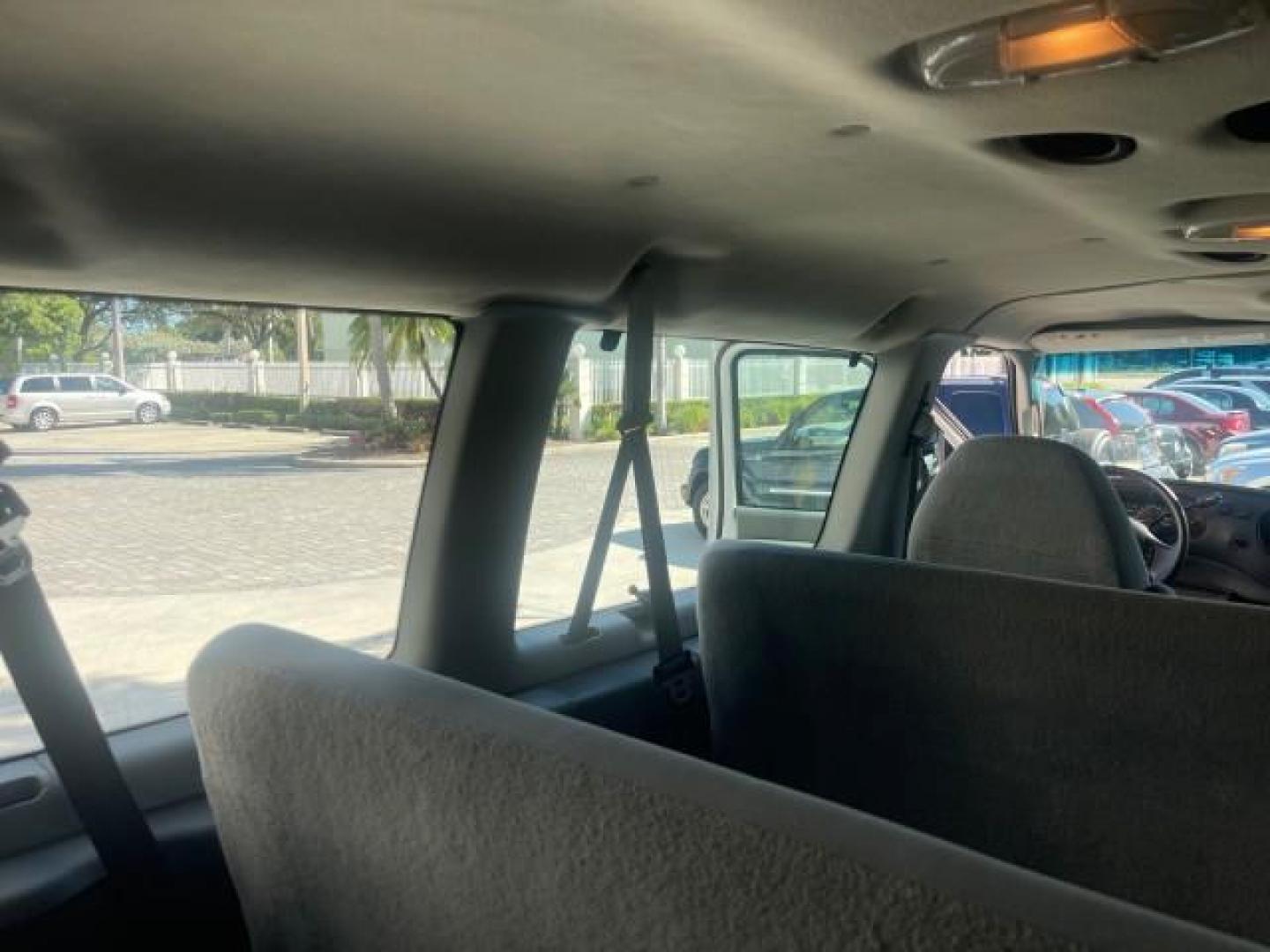 2006 Oxford White /Medium Flint Ford Econoline Wagon XLT LOW MILES 76,474 E350 15 PASS (1FBSS31L36H) with an 5.4L EFI V8 Engine engine, Automatic transmission, located at 4701 North Dixie Hwy, Pompano Beach, FL, 33064, (954) 422-2889, 26.240938, -80.123474 - OUR WEBPAGE FLORIDACARS1.COM HAS OVER 100 PHOTOS AND FREE CARFAX LINK 2006 FORD E-SERIES E-350 SD XLT 15 PASSENGER VAN NEW $29,805 VIN: 1FBSS31L36HA01462 1 F B S S 3 1 L 3 6 H A 0 1 4 6 2 VAN 5.4L V8 F GASOLINE REAR WHEEL DRIVE Features ABS Brakes Air Conditioning AM/FM Stereo Automatic Transmission - Photo#80