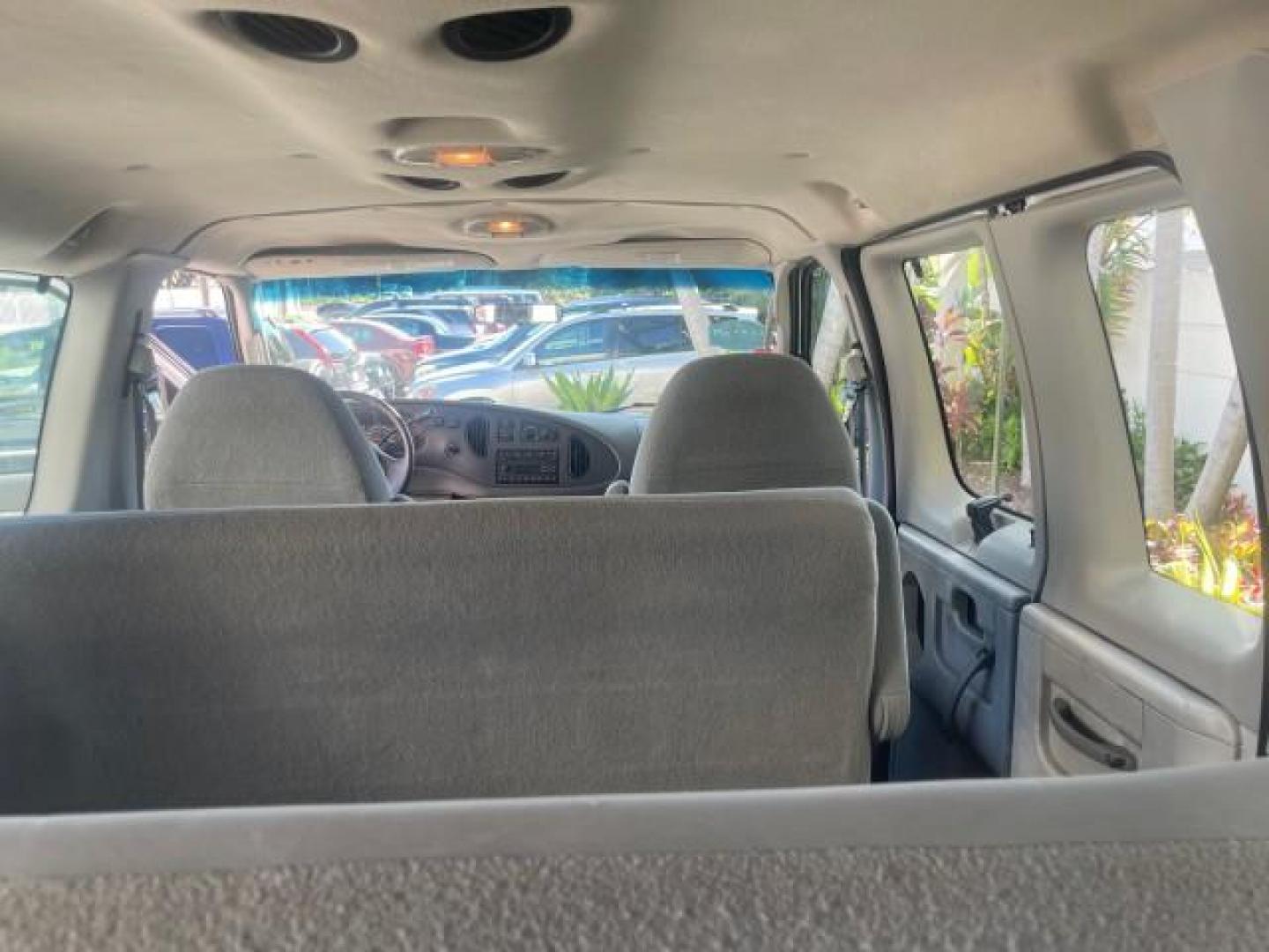 2006 Oxford White /Medium Flint Ford Econoline Wagon XLT LOW MILES 76,474 E350 15 PASS (1FBSS31L36H) with an 5.4L EFI V8 Engine engine, Automatic transmission, located at 4701 North Dixie Hwy, Pompano Beach, FL, 33064, (954) 422-2889, 26.240938, -80.123474 - OUR WEBPAGE FLORIDACARS1.COM HAS OVER 100 PHOTOS AND FREE CARFAX LINK 2006 FORD E-SERIES E-350 SD XLT 15 PASSENGER VAN NEW $29,805 VIN: 1FBSS31L36HA01462 1 F B S S 3 1 L 3 6 H A 0 1 4 6 2 VAN 5.4L V8 F GASOLINE REAR WHEEL DRIVE Features ABS Brakes Air Conditioning AM/FM Stereo Automatic Transmission - Photo#83