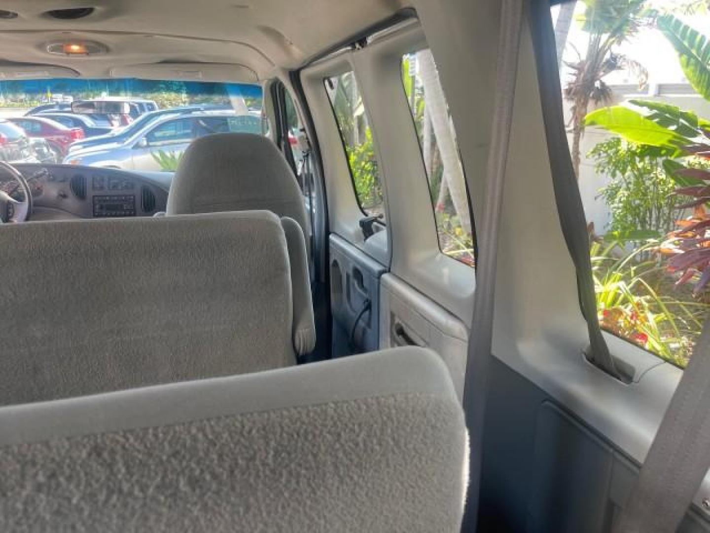 2006 Oxford White /Medium Flint Ford Econoline Wagon XLT LOW MILES 76,474 E350 15 PASS (1FBSS31L36H) with an 5.4L EFI V8 Engine engine, Automatic transmission, located at 4701 North Dixie Hwy, Pompano Beach, FL, 33064, (954) 422-2889, 26.240938, -80.123474 - OUR WEBPAGE FLORIDACARS1.COM HAS OVER 100 PHOTOS AND FREE CARFAX LINK 2006 FORD E-SERIES E-350 SD XLT 15 PASSENGER VAN NEW $29,805 VIN: 1FBSS31L36HA01462 1 F B S S 3 1 L 3 6 H A 0 1 4 6 2 VAN 5.4L V8 F GASOLINE REAR WHEEL DRIVE Features ABS Brakes Air Conditioning AM/FM Stereo Automatic Transmission - Photo#84