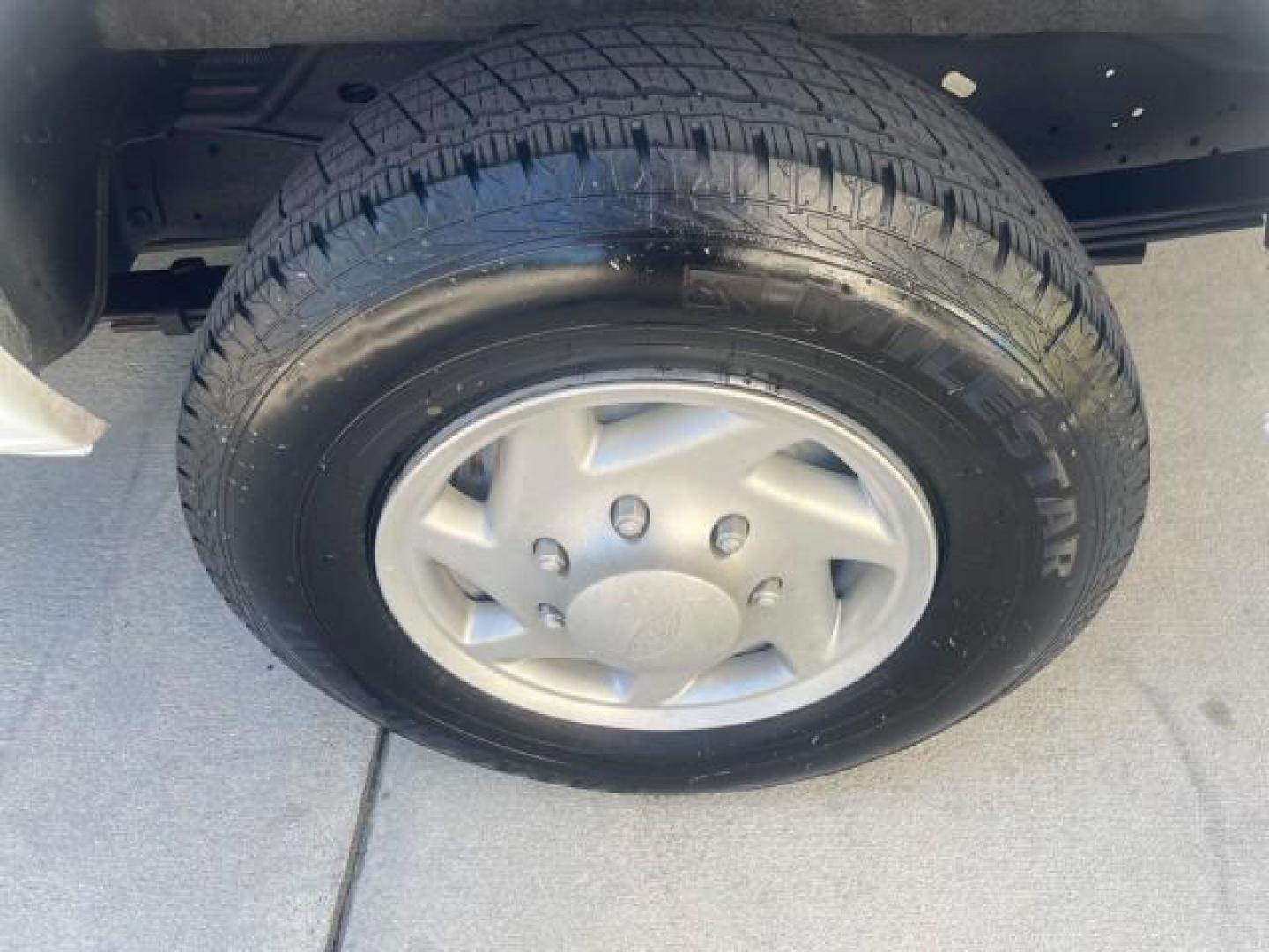2006 Oxford White /Medium Flint Ford Econoline Wagon XLT LOW MILES 76,474 E350 15 PASS (1FBSS31L36H) with an 5.4L EFI V8 Engine engine, Automatic transmission, located at 4701 North Dixie Hwy, Pompano Beach, FL, 33064, (954) 422-2889, 26.240938, -80.123474 - OUR WEBPAGE FLORIDACARS1.COM HAS OVER 100 PHOTOS AND FREE CARFAX LINK 2006 FORD E-SERIES E-350 SD XLT 15 PASSENGER VAN NEW $29,805 VIN: 1FBSS31L36HA01462 1 F B S S 3 1 L 3 6 H A 0 1 4 6 2 VAN 5.4L V8 F GASOLINE REAR WHEEL DRIVE Features ABS Brakes Air Conditioning AM/FM Stereo Automatic Transmission - Photo#91