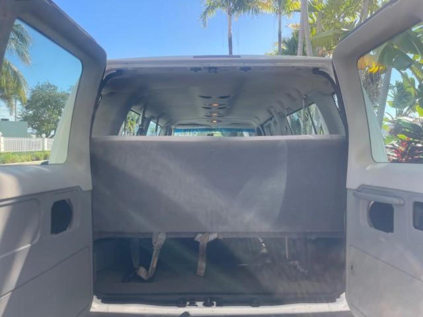 2006 Oxford White /Medium Flint Ford Econoline Wagon XLT LOW MILES 76,474 E350 15 PASS (1FBSS31L36H) with an 5.4L EFI V8 Engine engine, Automatic transmission, located at 4701 North Dixie Hwy, Pompano Beach, FL, 33064, (954) 422-2889, 26.240938, -80.123474 - OUR WEBPAGE FLORIDACARS1.COM HAS OVER 100 PHOTOS AND FREE CARFAX LINK 2006 FORD E-SERIES E-350 SD XLT 15 PASSENGER VAN NEW $29,805 VIN: 1FBSS31L36HA01462 1 F B S S 3 1 L 3 6 H A 0 1 4 6 2 VAN 5.4L V8 F GASOLINE REAR WHEEL DRIVE Features ABS Brakes Air Conditioning AM/FM Stereo Automatic Transmission - Photo#98