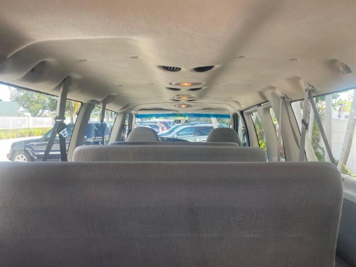 2006 Oxford White /Medium Flint Ford Econoline Wagon XLT LOW MILES 76,474 E350 15 PASS (1FBSS31L36H) with an 5.4L EFI V8 Engine engine, Automatic transmission, located at 4701 North Dixie Hwy, Pompano Beach, FL, 33064, (954) 422-2889, 26.240938, -80.123474 - OUR WEBPAGE FLORIDACARS1.COM HAS OVER 100 PHOTOS AND FREE CARFAX LINK 2006 FORD E-SERIES E-350 SD XLT 15 PASSENGER VAN NEW $29,805 VIN: 1FBSS31L36HA01462 1 F B S S 3 1 L 3 6 H A 0 1 4 6 2 VAN 5.4L V8 F GASOLINE REAR WHEEL DRIVE Features ABS Brakes Air Conditioning AM/FM Stereo Automatic Transmission - Photo#99