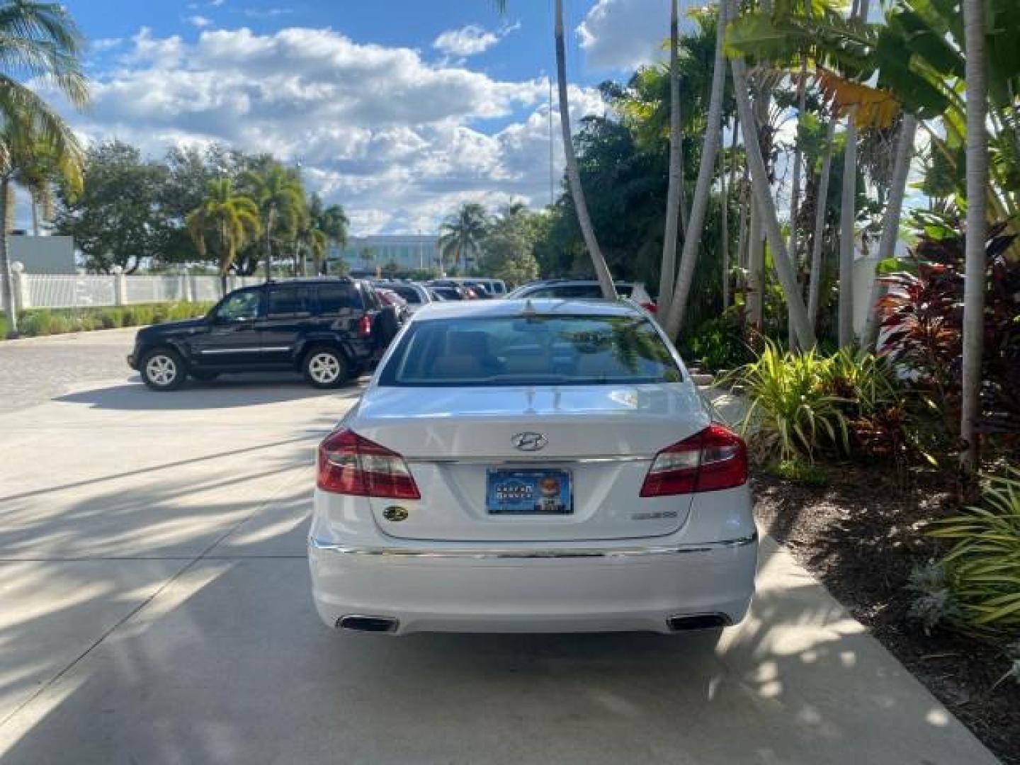 2013 White Satin Pearl /Saddle Hyundai Genesis 3.8L LOW MILES 33,576 (KMHGC4DD5DU) with an 3.8L DOHC GDI 24-Valve V6 Engine engine, Automatic transmission, located at 4701 North Dixie Hwy, Pompano Beach, FL, 33064, (954) 422-2889, 26.240938, -80.123474 - OUR WEBPAGE FLORIDACARS1.COM HAS OVER 100 PHOTOS AND FREE CARFAX LINK 2013 HYUNDAI GENESIS 3.8L VIN: KMHGC4DD5DU257871 K M H G C 4 D D 5 D U 2 5 7 8 7 1 SEDAN 4 DR 3.8L V6 F DOHC 24V GASOLINE REAR WHEEL DRIVE Features ABS Brakes Air Conditioning Alloy Wheels AM/FM Stereo Automatic Transmission Auxil - Photo#6