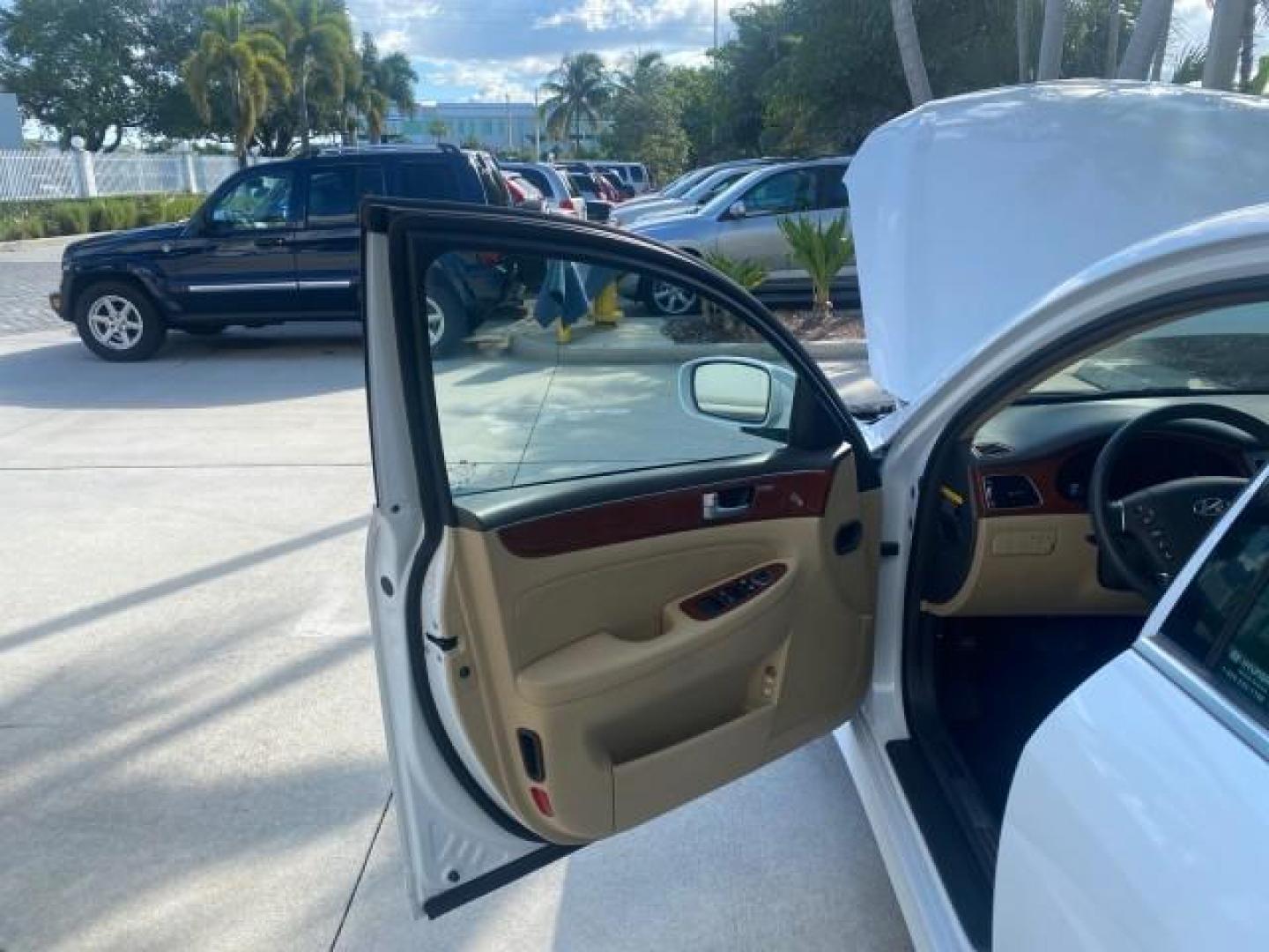 2013 White Satin Pearl /Saddle Hyundai Genesis 3.8L LOW MILES 33,576 (KMHGC4DD5DU) with an 3.8L DOHC GDI 24-Valve V6 Engine engine, Automatic transmission, located at 4701 North Dixie Hwy, Pompano Beach, FL, 33064, (954) 422-2889, 26.240938, -80.123474 - OUR WEBPAGE FLORIDACARS1.COM HAS OVER 100 PHOTOS AND FREE CARFAX LINK 2013 HYUNDAI GENESIS 3.8L VIN: KMHGC4DD5DU257871 K M H G C 4 D D 5 D U 2 5 7 8 7 1 SEDAN 4 DR 3.8L V6 F DOHC 24V GASOLINE REAR WHEEL DRIVE Features ABS Brakes Air Conditioning Alloy Wheels AM/FM Stereo Automatic Transmission Auxil - Photo#9