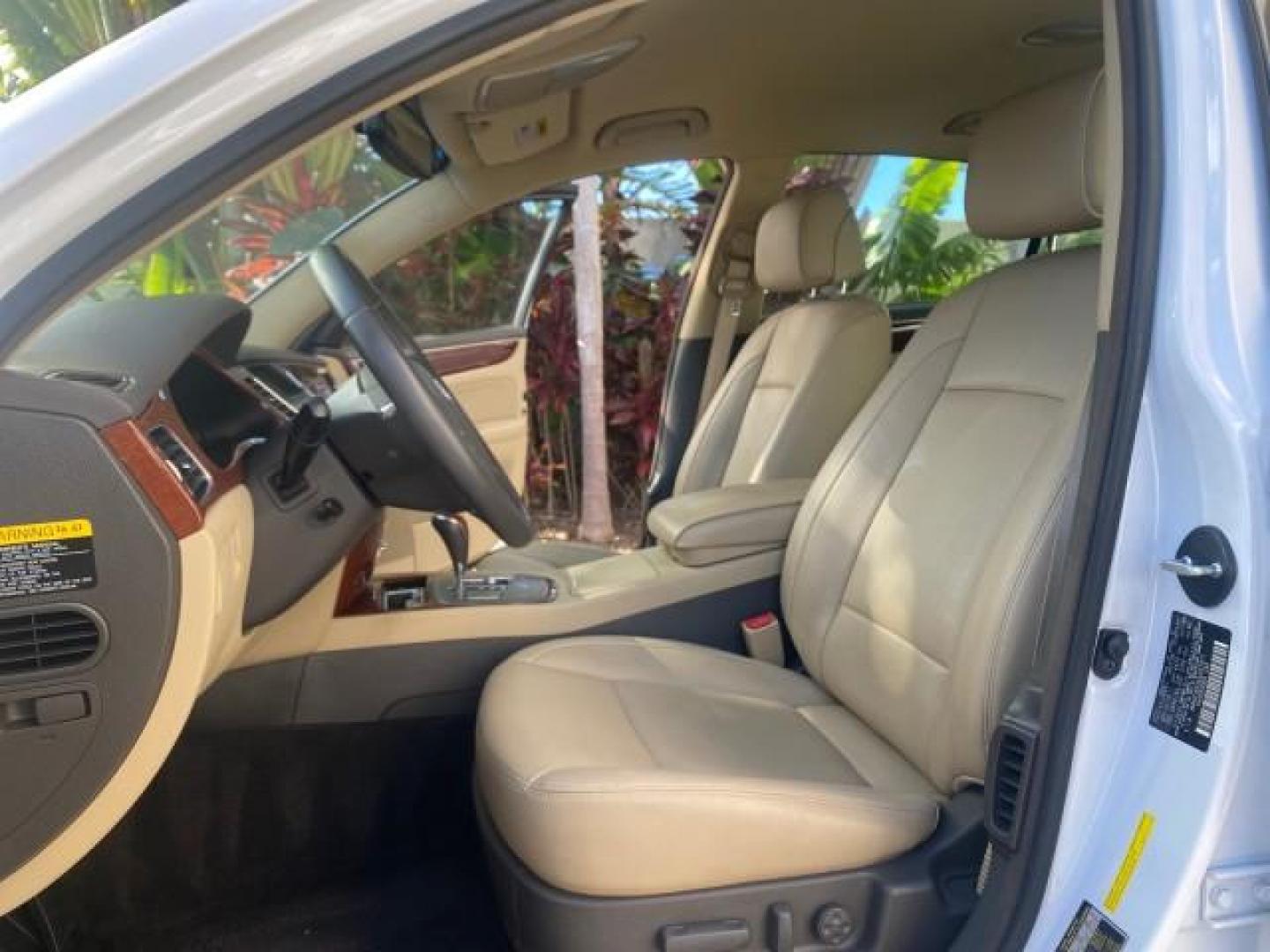 2013 White Satin Pearl /Saddle Hyundai Genesis 3.8L LOW MILES 33,576 (KMHGC4DD5DU) with an 3.8L DOHC GDI 24-Valve V6 Engine engine, Automatic transmission, located at 4701 North Dixie Hwy, Pompano Beach, FL, 33064, (954) 422-2889, 26.240938, -80.123474 - OUR WEBPAGE FLORIDACARS1.COM HAS OVER 100 PHOTOS AND FREE CARFAX LINK 2013 HYUNDAI GENESIS 3.8L VIN: KMHGC4DD5DU257871 K M H G C 4 D D 5 D U 2 5 7 8 7 1 SEDAN 4 DR 3.8L V6 F DOHC 24V GASOLINE REAR WHEEL DRIVE Features ABS Brakes Air Conditioning Alloy Wheels AM/FM Stereo Automatic Transmission Auxil - Photo#10