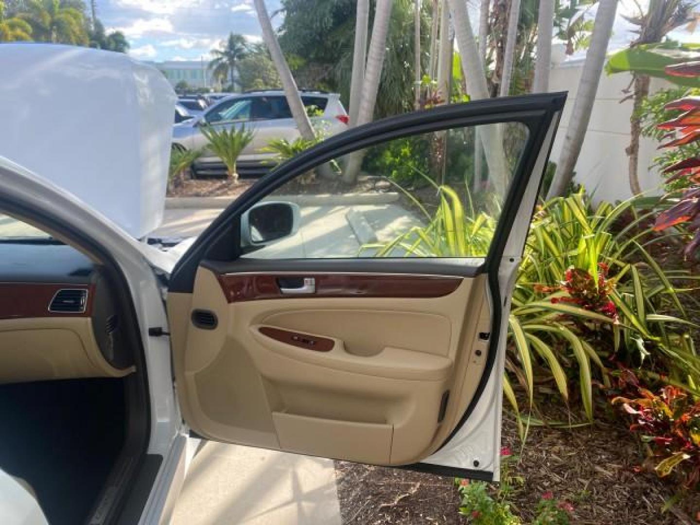 2013 White Satin Pearl /Saddle Hyundai Genesis 3.8L LOW MILES 33,576 (KMHGC4DD5DU) with an 3.8L DOHC GDI 24-Valve V6 Engine engine, Automatic transmission, located at 4701 North Dixie Hwy, Pompano Beach, FL, 33064, (954) 422-2889, 26.240938, -80.123474 - OUR WEBPAGE FLORIDACARS1.COM HAS OVER 100 PHOTOS AND FREE CARFAX LINK 2013 HYUNDAI GENESIS 3.8L VIN: KMHGC4DD5DU257871 K M H G C 4 D D 5 D U 2 5 7 8 7 1 SEDAN 4 DR 3.8L V6 F DOHC 24V GASOLINE REAR WHEEL DRIVE Features ABS Brakes Air Conditioning Alloy Wheels AM/FM Stereo Automatic Transmission Auxil - Photo#11