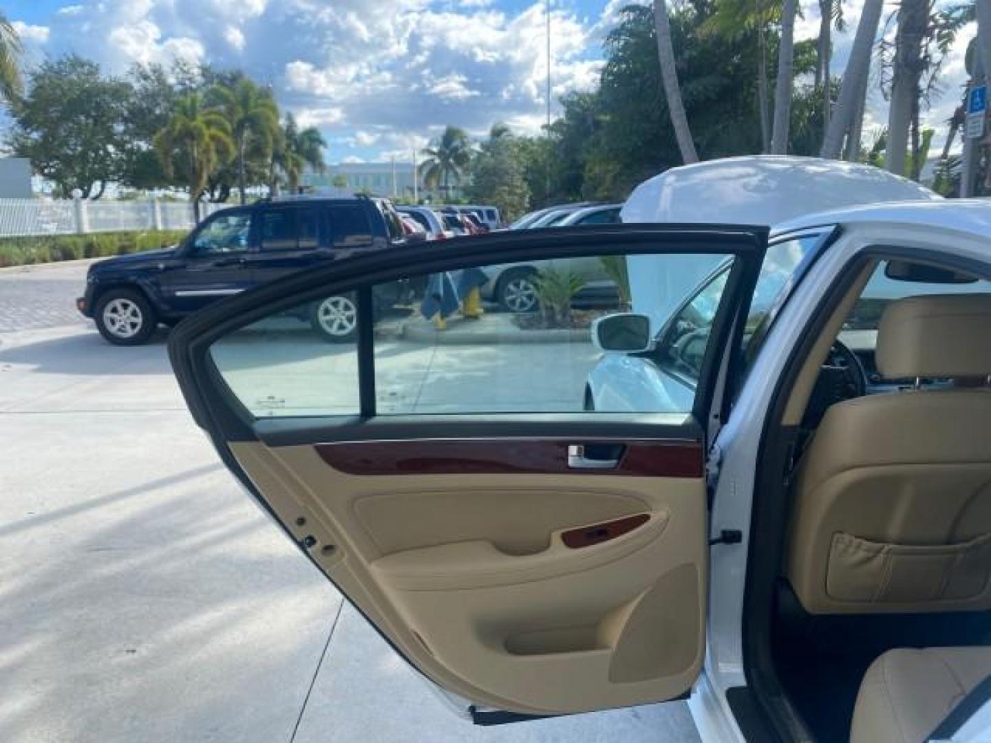 2013 White Satin Pearl /Saddle Hyundai Genesis 3.8L LOW MILES 33,576 (KMHGC4DD5DU) with an 3.8L DOHC GDI 24-Valve V6 Engine engine, Automatic transmission, located at 4701 North Dixie Hwy, Pompano Beach, FL, 33064, (954) 422-2889, 26.240938, -80.123474 - OUR WEBPAGE FLORIDACARS1.COM HAS OVER 100 PHOTOS AND FREE CARFAX LINK 2013 HYUNDAI GENESIS 3.8L VIN: KMHGC4DD5DU257871 K M H G C 4 D D 5 D U 2 5 7 8 7 1 SEDAN 4 DR 3.8L V6 F DOHC 24V GASOLINE REAR WHEEL DRIVE Features ABS Brakes Air Conditioning Alloy Wheels AM/FM Stereo Automatic Transmission Auxil - Photo#13