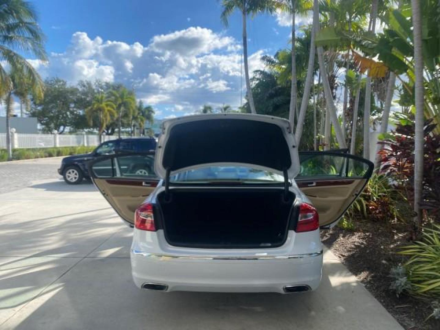 2013 White Satin Pearl /Saddle Hyundai Genesis 3.8L LOW MILES 33,576 (KMHGC4DD5DU) with an 3.8L DOHC GDI 24-Valve V6 Engine engine, Automatic transmission, located at 4701 North Dixie Hwy, Pompano Beach, FL, 33064, (954) 422-2889, 26.240938, -80.123474 - OUR WEBPAGE FLORIDACARS1.COM HAS OVER 100 PHOTOS AND FREE CARFAX LINK 2013 HYUNDAI GENESIS 3.8L VIN: KMHGC4DD5DU257871 K M H G C 4 D D 5 D U 2 5 7 8 7 1 SEDAN 4 DR 3.8L V6 F DOHC 24V GASOLINE REAR WHEEL DRIVE Features ABS Brakes Air Conditioning Alloy Wheels AM/FM Stereo Automatic Transmission Auxil - Photo#15