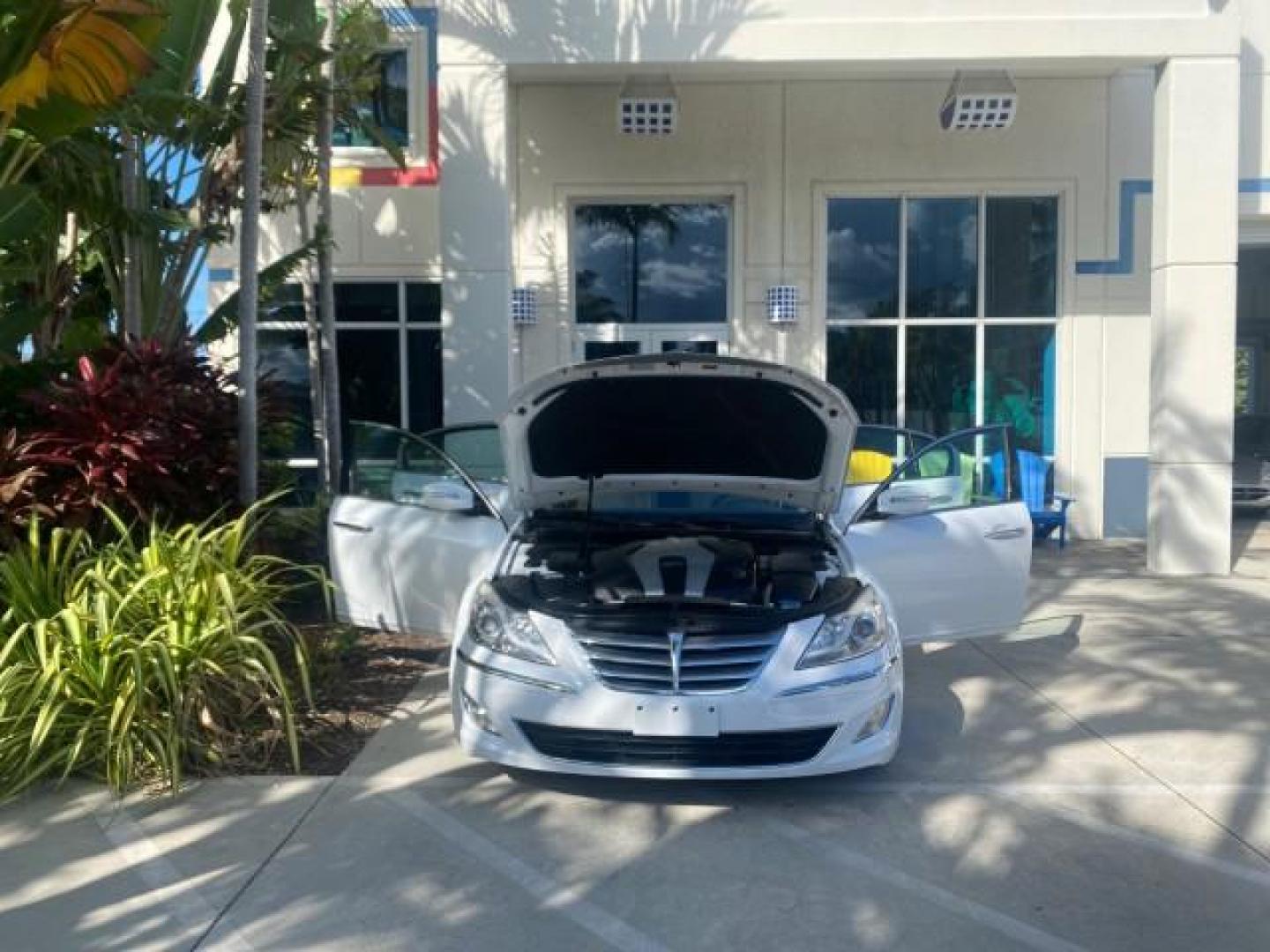 2013 White Satin Pearl /Saddle Hyundai Genesis 3.8L LOW MILES 33,576 (KMHGC4DD5DU) with an 3.8L DOHC GDI 24-Valve V6 Engine engine, Automatic transmission, located at 4701 North Dixie Hwy, Pompano Beach, FL, 33064, (954) 422-2889, 26.240938, -80.123474 - OUR WEBPAGE FLORIDACARS1.COM HAS OVER 100 PHOTOS AND FREE CARFAX LINK 2013 HYUNDAI GENESIS 3.8L VIN: KMHGC4DD5DU257871 K M H G C 4 D D 5 D U 2 5 7 8 7 1 SEDAN 4 DR 3.8L V6 F DOHC 24V GASOLINE REAR WHEEL DRIVE Features ABS Brakes Air Conditioning Alloy Wheels AM/FM Stereo Automatic Transmission Auxil - Photo#16