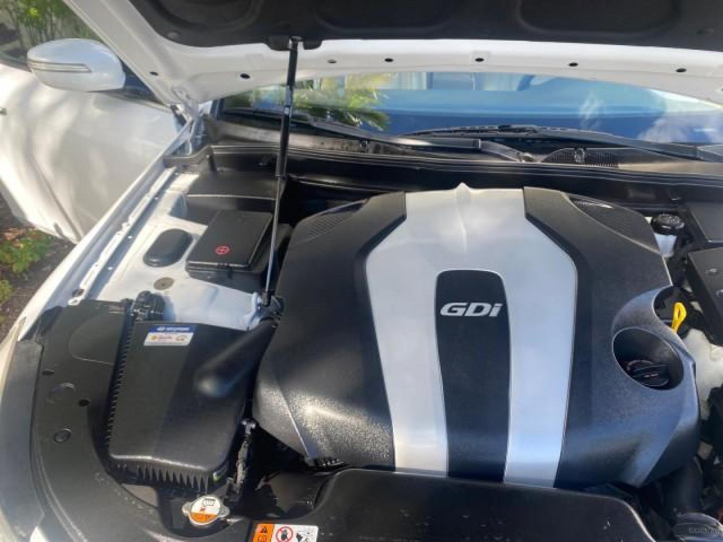 2013 White Satin Pearl /Saddle Hyundai Genesis 3.8L LOW MILES 33,576 (KMHGC4DD5DU) with an 3.8L DOHC GDI 24-Valve V6 Engine engine, Automatic transmission, located at 4701 North Dixie Hwy, Pompano Beach, FL, 33064, (954) 422-2889, 26.240938, -80.123474 - OUR WEBPAGE FLORIDACARS1.COM HAS OVER 100 PHOTOS AND FREE CARFAX LINK 2013 HYUNDAI GENESIS 3.8L VIN: KMHGC4DD5DU257871 K M H G C 4 D D 5 D U 2 5 7 8 7 1 SEDAN 4 DR 3.8L V6 F DOHC 24V GASOLINE REAR WHEEL DRIVE Features ABS Brakes Air Conditioning Alloy Wheels AM/FM Stereo Automatic Transmission Auxil - Photo#25