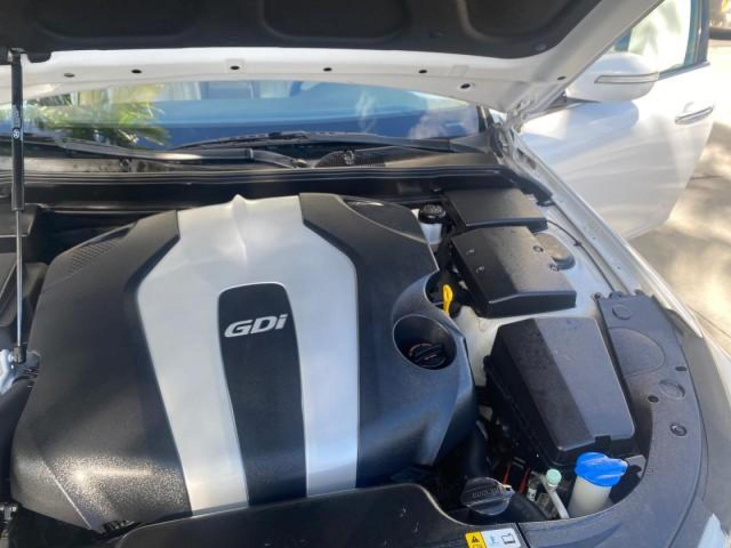 2013 White Satin Pearl /Saddle Hyundai Genesis 3.8L LOW MILES 33,576 (KMHGC4DD5DU) with an 3.8L DOHC GDI 24-Valve V6 Engine engine, Automatic transmission, located at 4701 North Dixie Hwy, Pompano Beach, FL, 33064, (954) 422-2889, 26.240938, -80.123474 - OUR WEBPAGE FLORIDACARS1.COM HAS OVER 100 PHOTOS AND FREE CARFAX LINK 2013 HYUNDAI GENESIS 3.8L VIN: KMHGC4DD5DU257871 K M H G C 4 D D 5 D U 2 5 7 8 7 1 SEDAN 4 DR 3.8L V6 F DOHC 24V GASOLINE REAR WHEEL DRIVE Features ABS Brakes Air Conditioning Alloy Wheels AM/FM Stereo Automatic Transmission Auxil - Photo#26