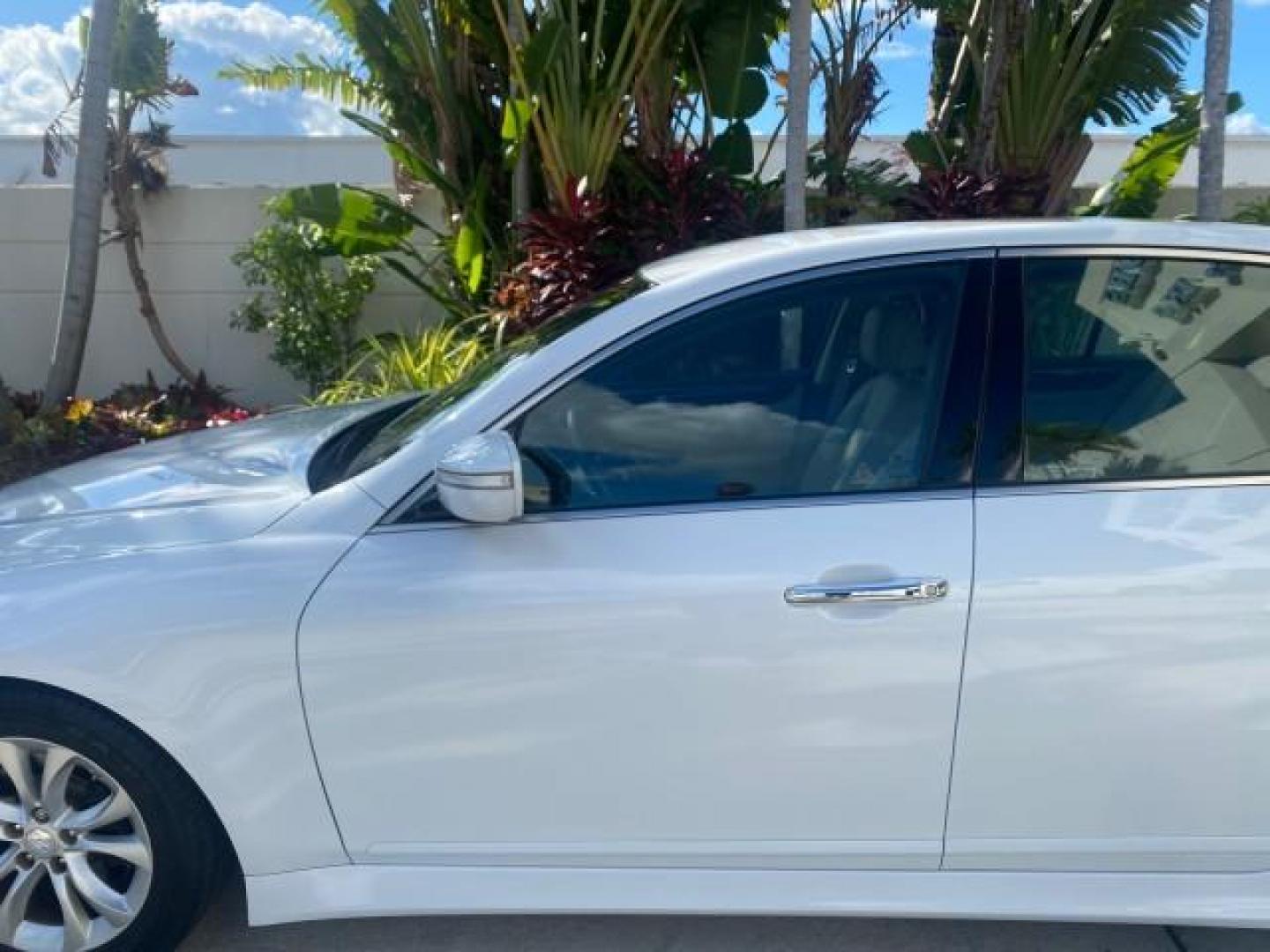 2013 White Satin Pearl /Saddle Hyundai Genesis 3.8L LOW MILES 33,576 (KMHGC4DD5DU) with an 3.8L DOHC GDI 24-Valve V6 Engine engine, Automatic transmission, located at 4701 North Dixie Hwy, Pompano Beach, FL, 33064, (954) 422-2889, 26.240938, -80.123474 - OUR WEBPAGE FLORIDACARS1.COM HAS OVER 100 PHOTOS AND FREE CARFAX LINK 2013 HYUNDAI GENESIS 3.8L VIN: KMHGC4DD5DU257871 K M H G C 4 D D 5 D U 2 5 7 8 7 1 SEDAN 4 DR 3.8L V6 F DOHC 24V GASOLINE REAR WHEEL DRIVE Features ABS Brakes Air Conditioning Alloy Wheels AM/FM Stereo Automatic Transmission Auxil - Photo#37