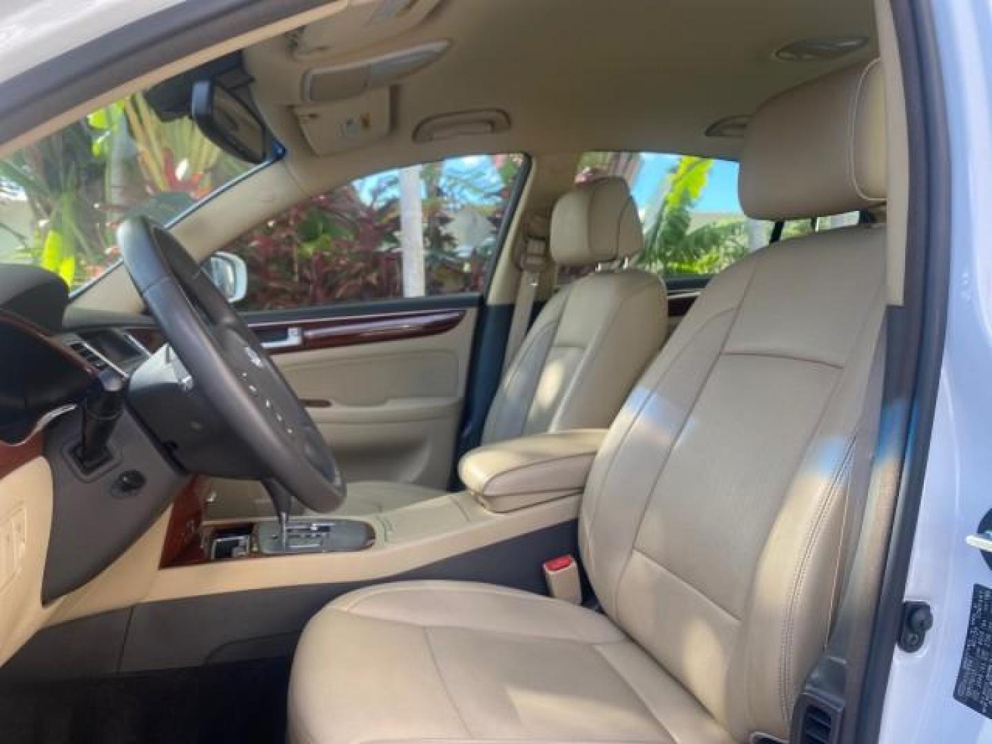 2013 White Satin Pearl /Saddle Hyundai Genesis 3.8L LOW MILES 33,576 (KMHGC4DD5DU) with an 3.8L DOHC GDI 24-Valve V6 Engine engine, Automatic transmission, located at 4701 North Dixie Hwy, Pompano Beach, FL, 33064, (954) 422-2889, 26.240938, -80.123474 - OUR WEBPAGE FLORIDACARS1.COM HAS OVER 100 PHOTOS AND FREE CARFAX LINK 2013 HYUNDAI GENESIS 3.8L VIN: KMHGC4DD5DU257871 K M H G C 4 D D 5 D U 2 5 7 8 7 1 SEDAN 4 DR 3.8L V6 F DOHC 24V GASOLINE REAR WHEEL DRIVE Features ABS Brakes Air Conditioning Alloy Wheels AM/FM Stereo Automatic Transmission Auxil - Photo#43