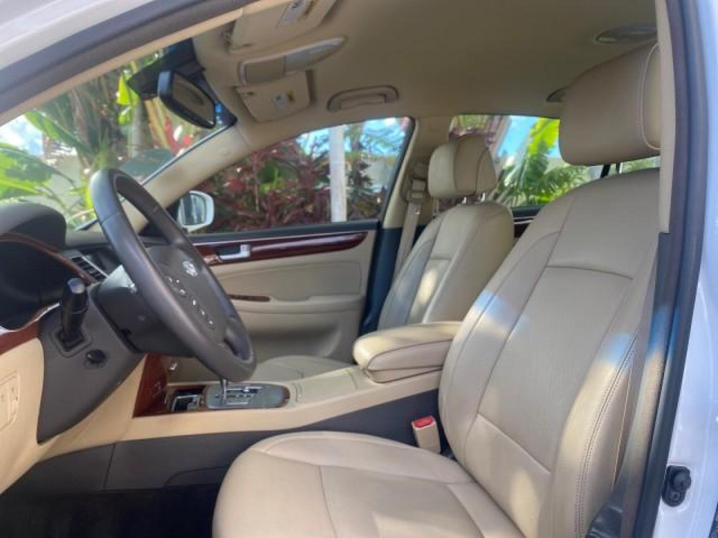 2013 White Satin Pearl /Saddle Hyundai Genesis 3.8L LOW MILES 33,576 (KMHGC4DD5DU) with an 3.8L DOHC GDI 24-Valve V6 Engine engine, Automatic transmission, located at 4701 North Dixie Hwy, Pompano Beach, FL, 33064, (954) 422-2889, 26.240938, -80.123474 - OUR WEBPAGE FLORIDACARS1.COM HAS OVER 100 PHOTOS AND FREE CARFAX LINK 2013 HYUNDAI GENESIS 3.8L VIN: KMHGC4DD5DU257871 K M H G C 4 D D 5 D U 2 5 7 8 7 1 SEDAN 4 DR 3.8L V6 F DOHC 24V GASOLINE REAR WHEEL DRIVE Features ABS Brakes Air Conditioning Alloy Wheels AM/FM Stereo Automatic Transmission Auxil - Photo#44