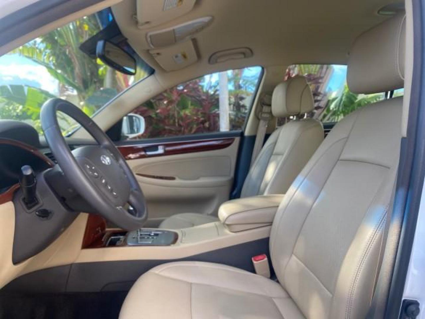 2013 White Satin Pearl /Saddle Hyundai Genesis 3.8L LOW MILES 33,576 (KMHGC4DD5DU) with an 3.8L DOHC GDI 24-Valve V6 Engine engine, Automatic transmission, located at 4701 North Dixie Hwy, Pompano Beach, FL, 33064, (954) 422-2889, 26.240938, -80.123474 - OUR WEBPAGE FLORIDACARS1.COM HAS OVER 100 PHOTOS AND FREE CARFAX LINK 2013 HYUNDAI GENESIS 3.8L VIN: KMHGC4DD5DU257871 K M H G C 4 D D 5 D U 2 5 7 8 7 1 SEDAN 4 DR 3.8L V6 F DOHC 24V GASOLINE REAR WHEEL DRIVE Features ABS Brakes Air Conditioning Alloy Wheels AM/FM Stereo Automatic Transmission Auxil - Photo#45