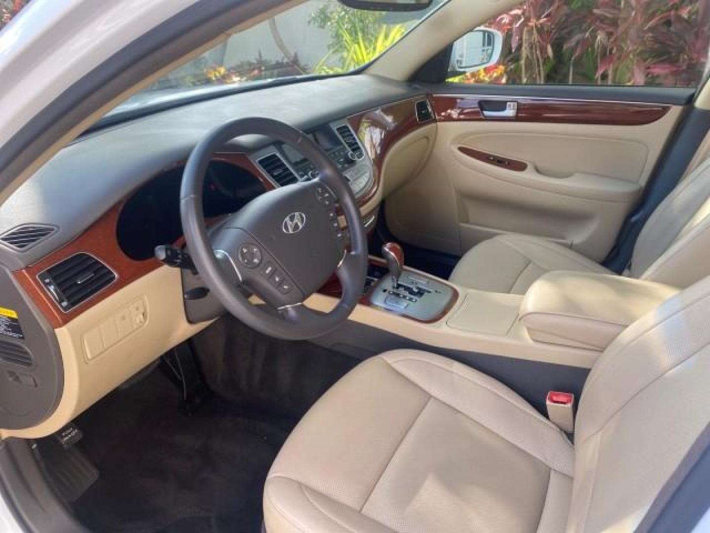 2013 White Satin Pearl /Saddle Hyundai Genesis 3.8L LOW MILES 33,576 (KMHGC4DD5DU) with an 3.8L DOHC GDI 24-Valve V6 Engine engine, Automatic transmission, located at 4701 North Dixie Hwy, Pompano Beach, FL, 33064, (954) 422-2889, 26.240938, -80.123474 - OUR WEBPAGE FLORIDACARS1.COM HAS OVER 100 PHOTOS AND FREE CARFAX LINK 2013 HYUNDAI GENESIS 3.8L VIN: KMHGC4DD5DU257871 K M H G C 4 D D 5 D U 2 5 7 8 7 1 SEDAN 4 DR 3.8L V6 F DOHC 24V GASOLINE REAR WHEEL DRIVE Features ABS Brakes Air Conditioning Alloy Wheels AM/FM Stereo Automatic Transmission Auxil - Photo#46