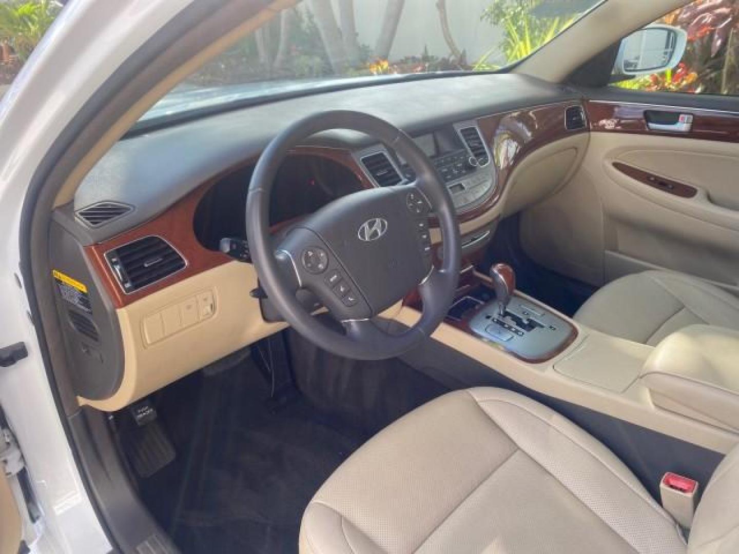 2013 White Satin Pearl /Saddle Hyundai Genesis 3.8L LOW MILES 33,576 (KMHGC4DD5DU) with an 3.8L DOHC GDI 24-Valve V6 Engine engine, Automatic transmission, located at 4701 North Dixie Hwy, Pompano Beach, FL, 33064, (954) 422-2889, 26.240938, -80.123474 - OUR WEBPAGE FLORIDACARS1.COM HAS OVER 100 PHOTOS AND FREE CARFAX LINK 2013 HYUNDAI GENESIS 3.8L VIN: KMHGC4DD5DU257871 K M H G C 4 D D 5 D U 2 5 7 8 7 1 SEDAN 4 DR 3.8L V6 F DOHC 24V GASOLINE REAR WHEEL DRIVE Features ABS Brakes Air Conditioning Alloy Wheels AM/FM Stereo Automatic Transmission Auxil - Photo#47