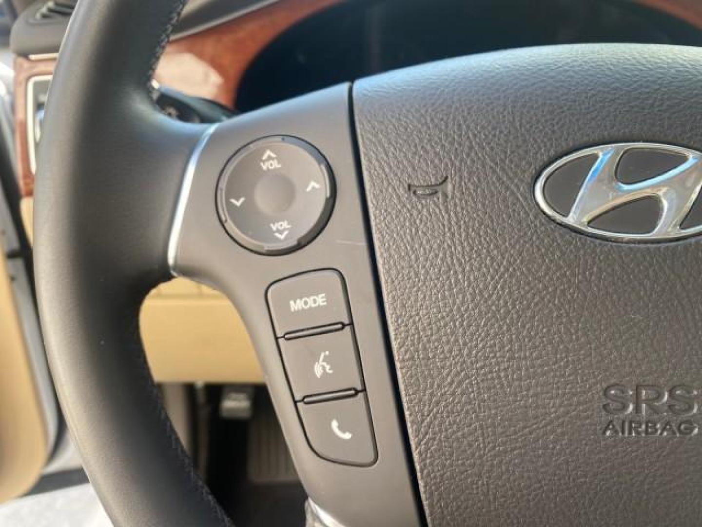 2013 White Satin Pearl /Saddle Hyundai Genesis 3.8L LOW MILES 33,576 (KMHGC4DD5DU) with an 3.8L DOHC GDI 24-Valve V6 Engine engine, Automatic transmission, located at 4701 North Dixie Hwy, Pompano Beach, FL, 33064, (954) 422-2889, 26.240938, -80.123474 - OUR WEBPAGE FLORIDACARS1.COM HAS OVER 100 PHOTOS AND FREE CARFAX LINK 2013 HYUNDAI GENESIS 3.8L VIN: KMHGC4DD5DU257871 K M H G C 4 D D 5 D U 2 5 7 8 7 1 SEDAN 4 DR 3.8L V6 F DOHC 24V GASOLINE REAR WHEEL DRIVE Features ABS Brakes Air Conditioning Alloy Wheels AM/FM Stereo Automatic Transmission Auxil - Photo#49