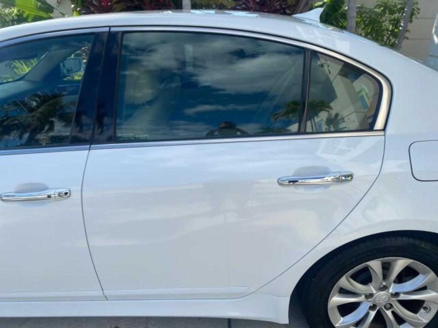 2013 White Satin Pearl /Saddle Hyundai Genesis 3.8L LOW MILES 33,576 (KMHGC4DD5DU) with an 3.8L DOHC GDI 24-Valve V6 Engine engine, Automatic transmission, located at 4701 North Dixie Hwy, Pompano Beach, FL, 33064, (954) 422-2889, 26.240938, -80.123474 - OUR WEBPAGE FLORIDACARS1.COM HAS OVER 100 PHOTOS AND FREE CARFAX LINK 2013 HYUNDAI GENESIS 3.8L VIN: KMHGC4DD5DU257871 K M H G C 4 D D 5 D U 2 5 7 8 7 1 SEDAN 4 DR 3.8L V6 F DOHC 24V GASOLINE REAR WHEEL DRIVE Features ABS Brakes Air Conditioning Alloy Wheels AM/FM Stereo Automatic Transmission Auxil - Photo#69