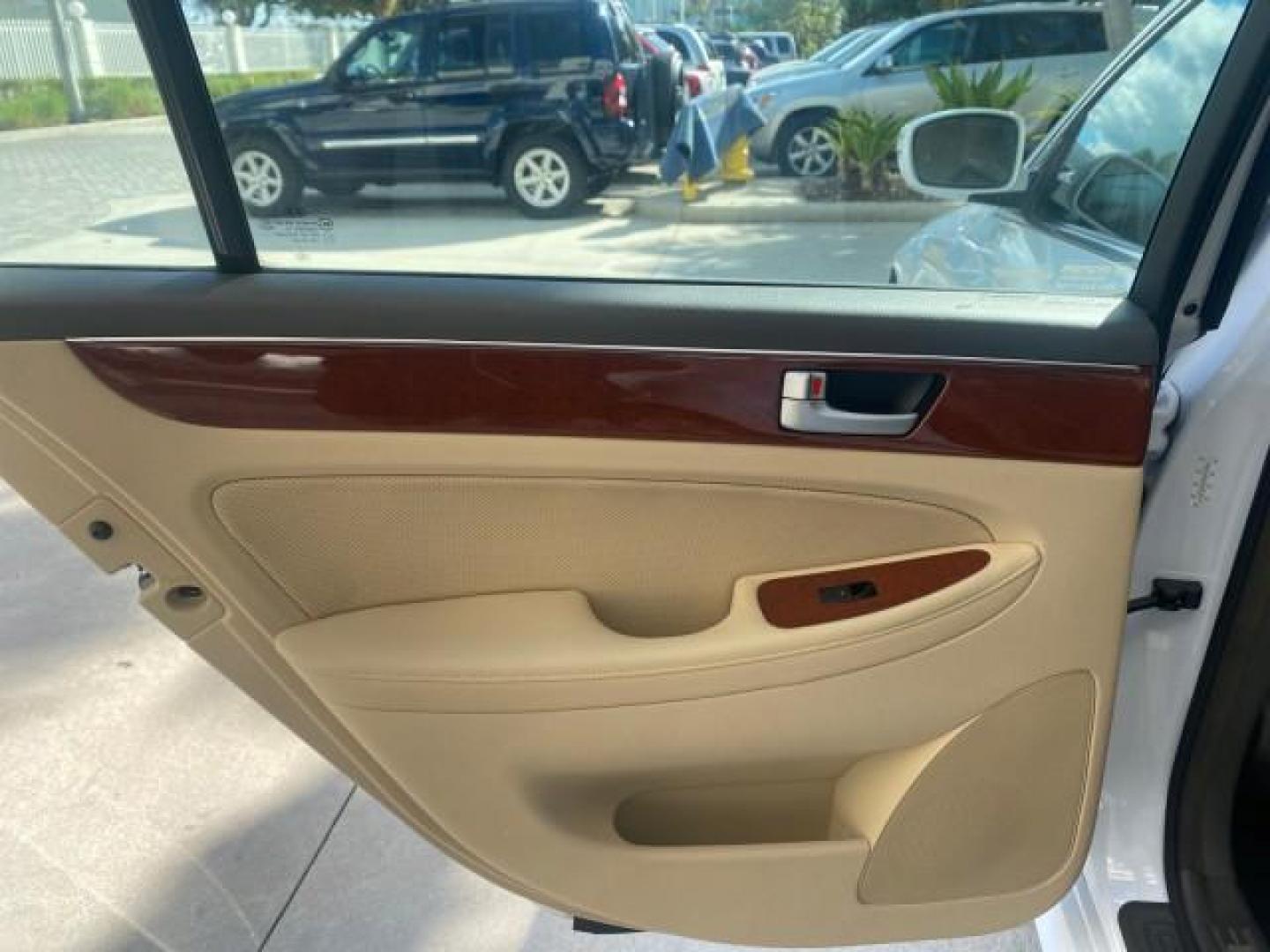 2013 White Satin Pearl /Saddle Hyundai Genesis 3.8L LOW MILES 33,576 (KMHGC4DD5DU) with an 3.8L DOHC GDI 24-Valve V6 Engine engine, Automatic transmission, located at 4701 North Dixie Hwy, Pompano Beach, FL, 33064, (954) 422-2889, 26.240938, -80.123474 - OUR WEBPAGE FLORIDACARS1.COM HAS OVER 100 PHOTOS AND FREE CARFAX LINK 2013 HYUNDAI GENESIS 3.8L VIN: KMHGC4DD5DU257871 K M H G C 4 D D 5 D U 2 5 7 8 7 1 SEDAN 4 DR 3.8L V6 F DOHC 24V GASOLINE REAR WHEEL DRIVE Features ABS Brakes Air Conditioning Alloy Wheels AM/FM Stereo Automatic Transmission Auxil - Photo#70