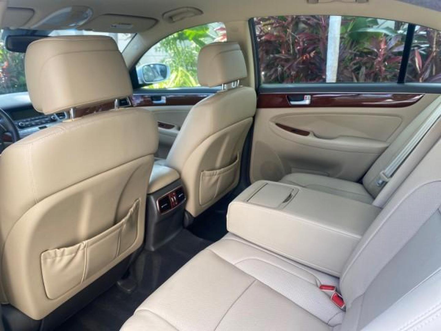 2013 White Satin Pearl /Saddle Hyundai Genesis 3.8L LOW MILES 33,576 (KMHGC4DD5DU) with an 3.8L DOHC GDI 24-Valve V6 Engine engine, Automatic transmission, located at 4701 North Dixie Hwy, Pompano Beach, FL, 33064, (954) 422-2889, 26.240938, -80.123474 - OUR WEBPAGE FLORIDACARS1.COM HAS OVER 100 PHOTOS AND FREE CARFAX LINK 2013 HYUNDAI GENESIS 3.8L VIN: KMHGC4DD5DU257871 K M H G C 4 D D 5 D U 2 5 7 8 7 1 SEDAN 4 DR 3.8L V6 F DOHC 24V GASOLINE REAR WHEEL DRIVE Features ABS Brakes Air Conditioning Alloy Wheels AM/FM Stereo Automatic Transmission Auxil - Photo#75