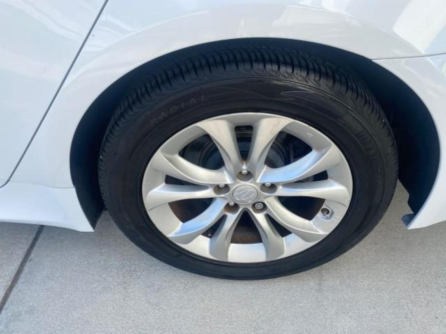 2013 White Satin Pearl /Saddle Hyundai Genesis 3.8L LOW MILES 33,576 (KMHGC4DD5DU) with an 3.8L DOHC GDI 24-Valve V6 Engine engine, Automatic transmission, located at 4701 North Dixie Hwy, Pompano Beach, FL, 33064, (954) 422-2889, 26.240938, -80.123474 - OUR WEBPAGE FLORIDACARS1.COM HAS OVER 100 PHOTOS AND FREE CARFAX LINK 2013 HYUNDAI GENESIS 3.8L VIN: KMHGC4DD5DU257871 K M H G C 4 D D 5 D U 2 5 7 8 7 1 SEDAN 4 DR 3.8L V6 F DOHC 24V GASOLINE REAR WHEEL DRIVE Features ABS Brakes Air Conditioning Alloy Wheels AM/FM Stereo Automatic Transmission Auxil - Photo#82