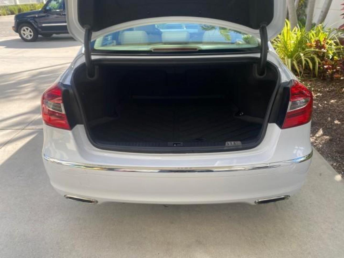 2013 White Satin Pearl /Saddle Hyundai Genesis 3.8L LOW MILES 33,576 (KMHGC4DD5DU) with an 3.8L DOHC GDI 24-Valve V6 Engine engine, Automatic transmission, located at 4701 North Dixie Hwy, Pompano Beach, FL, 33064, (954) 422-2889, 26.240938, -80.123474 - OUR WEBPAGE FLORIDACARS1.COM HAS OVER 100 PHOTOS AND FREE CARFAX LINK 2013 HYUNDAI GENESIS 3.8L VIN: KMHGC4DD5DU257871 K M H G C 4 D D 5 D U 2 5 7 8 7 1 SEDAN 4 DR 3.8L V6 F DOHC 24V GASOLINE REAR WHEEL DRIVE Features ABS Brakes Air Conditioning Alloy Wheels AM/FM Stereo Automatic Transmission Auxil - Photo#91