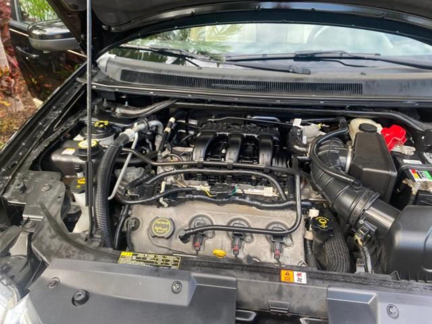 2008 Black /Camel Ford Taurus X Eddie Bauer LOW MILES 46,208 (1FMDK07W38G) with an 3.5L SMPI 24-Valve V6 Duratec Engine engine, Automatic transmission, located at 4701 North Dixie Hwy, Pompano Beach, FL, 33064, (954) 422-2889, 26.240938, -80.123474 - OUR WEBPAGE FLORIDACARS1.COM HAS OVER 100 PHOTOS AND FREE CARFAX LINK 2008 FORD TAURUS X EDDIE BAUER SUNROOF VIN: 1FMDK07W38GA10624 1 F M D K 0 7 W 3 8 G A 1 0 6 2 4 4 DOOR WAGON/SPORT UTILITY 3.5L V6 F GASOLINE FRONT WHEEL DRIVE Features ABS Brakes Air Conditioning Alloy Wheels AM/FM Stereo Automat - Photo#24