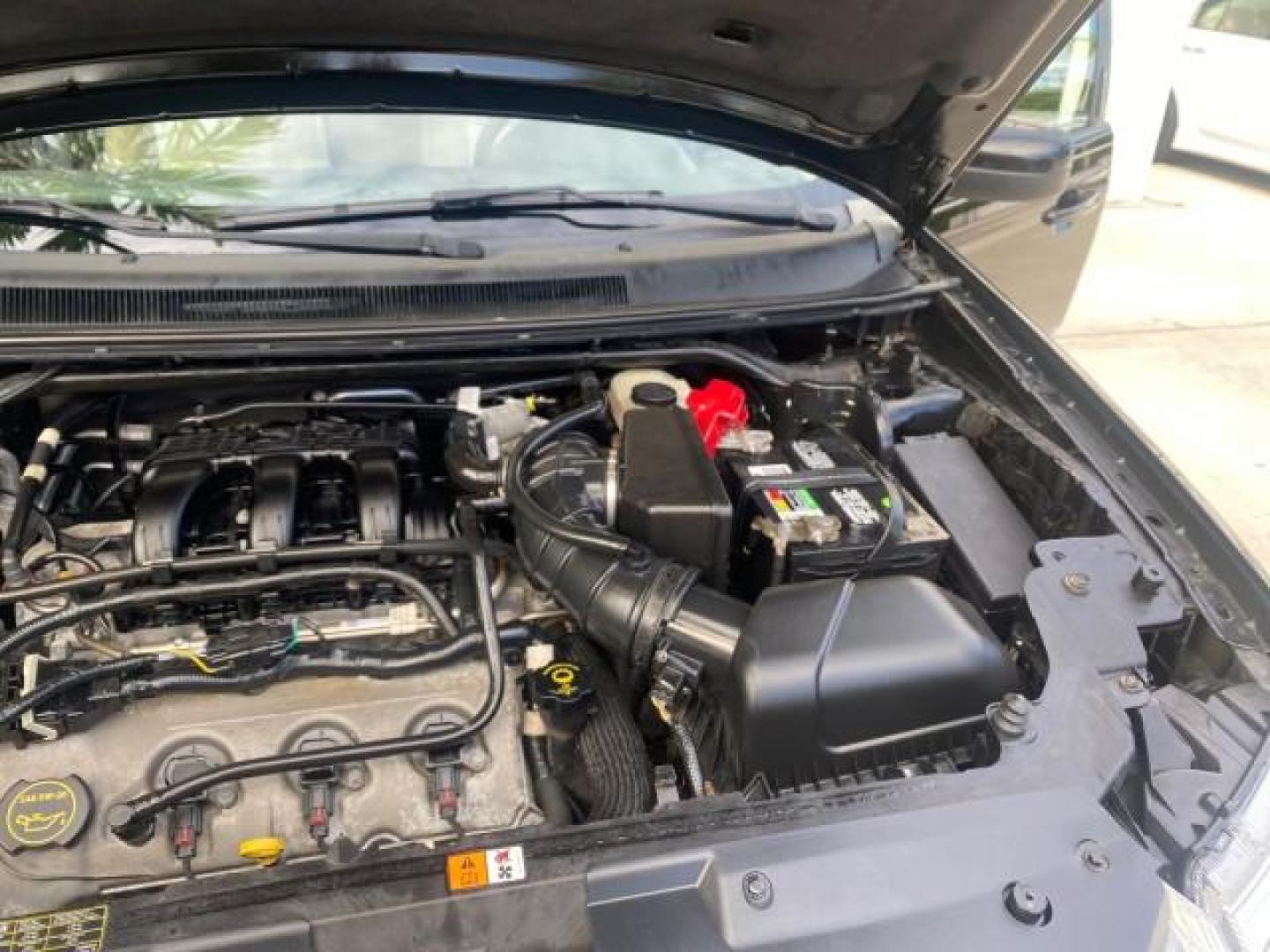 2008 Black /Camel Ford Taurus X Eddie Bauer LOW MILES 46,208 (1FMDK07W38G) with an 3.5L SMPI 24-Valve V6 Duratec Engine engine, Automatic transmission, located at 4701 North Dixie Hwy, Pompano Beach, FL, 33064, (954) 422-2889, 26.240938, -80.123474 - OUR WEBPAGE FLORIDACARS1.COM HAS OVER 100 PHOTOS AND FREE CARFAX LINK 2008 FORD TAURUS X EDDIE BAUER SUNROOF VIN: 1FMDK07W38GA10624 1 F M D K 0 7 W 3 8 G A 1 0 6 2 4 4 DOOR WAGON/SPORT UTILITY 3.5L V6 F GASOLINE FRONT WHEEL DRIVE Features ABS Brakes Air Conditioning Alloy Wheels AM/FM Stereo Automat - Photo#25