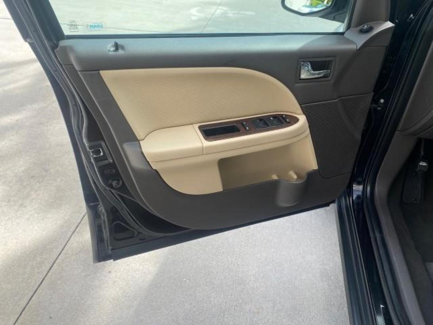 2008 Black /Camel Ford Taurus X Eddie Bauer LOW MILES 46,208 (1FMDK07W38G) with an 3.5L SMPI 24-Valve V6 Duratec Engine engine, Automatic transmission, located at 4701 North Dixie Hwy, Pompano Beach, FL, 33064, (954) 422-2889, 26.240938, -80.123474 - OUR WEBPAGE FLORIDACARS1.COM HAS OVER 100 PHOTOS AND FREE CARFAX LINK 2008 FORD TAURUS X EDDIE BAUER SUNROOF VIN: 1FMDK07W38GA10624 1 F M D K 0 7 W 3 8 G A 1 0 6 2 4 4 DOOR WAGON/SPORT UTILITY 3.5L V6 F GASOLINE FRONT WHEEL DRIVE Features ABS Brakes Air Conditioning Alloy Wheels AM/FM Stereo Automat - Photo#41