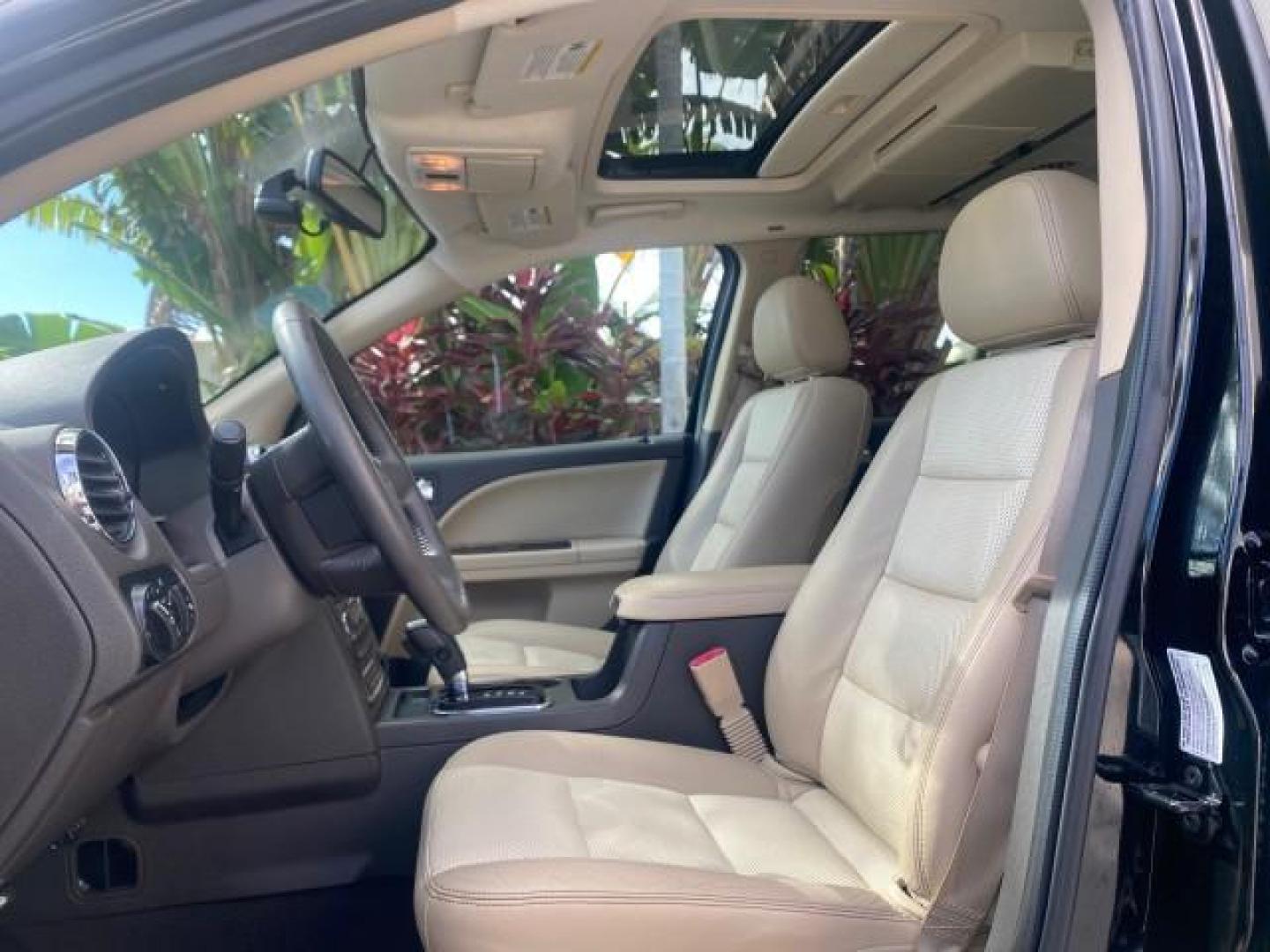 2008 Black /Camel Ford Taurus X Eddie Bauer LOW MILES 46,208 (1FMDK07W38G) with an 3.5L SMPI 24-Valve V6 Duratec Engine engine, Automatic transmission, located at 4701 North Dixie Hwy, Pompano Beach, FL, 33064, (954) 422-2889, 26.240938, -80.123474 - OUR WEBPAGE FLORIDACARS1.COM HAS OVER 100 PHOTOS AND FREE CARFAX LINK 2008 FORD TAURUS X EDDIE BAUER SUNROOF VIN: 1FMDK07W38GA10624 1 F M D K 0 7 W 3 8 G A 1 0 6 2 4 4 DOOR WAGON/SPORT UTILITY 3.5L V6 F GASOLINE FRONT WHEEL DRIVE Features ABS Brakes Air Conditioning Alloy Wheels AM/FM Stereo Automat - Photo#42