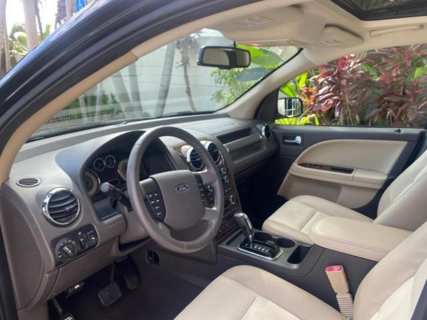 2008 Black /Camel Ford Taurus X Eddie Bauer LOW MILES 46,208 (1FMDK07W38G) with an 3.5L SMPI 24-Valve V6 Duratec Engine engine, Automatic transmission, located at 4701 North Dixie Hwy, Pompano Beach, FL, 33064, (954) 422-2889, 26.240938, -80.123474 - OUR WEBPAGE FLORIDACARS1.COM HAS OVER 100 PHOTOS AND FREE CARFAX LINK 2008 FORD TAURUS X EDDIE BAUER SUNROOF VIN: 1FMDK07W38GA10624 1 F M D K 0 7 W 3 8 G A 1 0 6 2 4 4 DOOR WAGON/SPORT UTILITY 3.5L V6 F GASOLINE FRONT WHEEL DRIVE Features ABS Brakes Air Conditioning Alloy Wheels AM/FM Stereo Automat - Photo#45