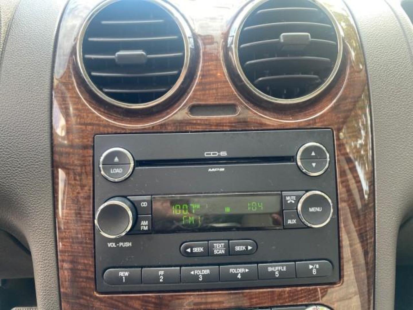 2008 Black /Camel Ford Taurus X Eddie Bauer LOW MILES 46,208 (1FMDK07W38G) with an 3.5L SMPI 24-Valve V6 Duratec Engine engine, Automatic transmission, located at 4701 North Dixie Hwy, Pompano Beach, FL, 33064, (954) 422-2889, 26.240938, -80.123474 - OUR WEBPAGE FLORIDACARS1.COM HAS OVER 100 PHOTOS AND FREE CARFAX LINK 2008 FORD TAURUS X EDDIE BAUER SUNROOF VIN: 1FMDK07W38GA10624 1 F M D K 0 7 W 3 8 G A 1 0 6 2 4 4 DOOR WAGON/SPORT UTILITY 3.5L V6 F GASOLINE FRONT WHEEL DRIVE Features ABS Brakes Air Conditioning Alloy Wheels AM/FM Stereo Automat - Photo#56