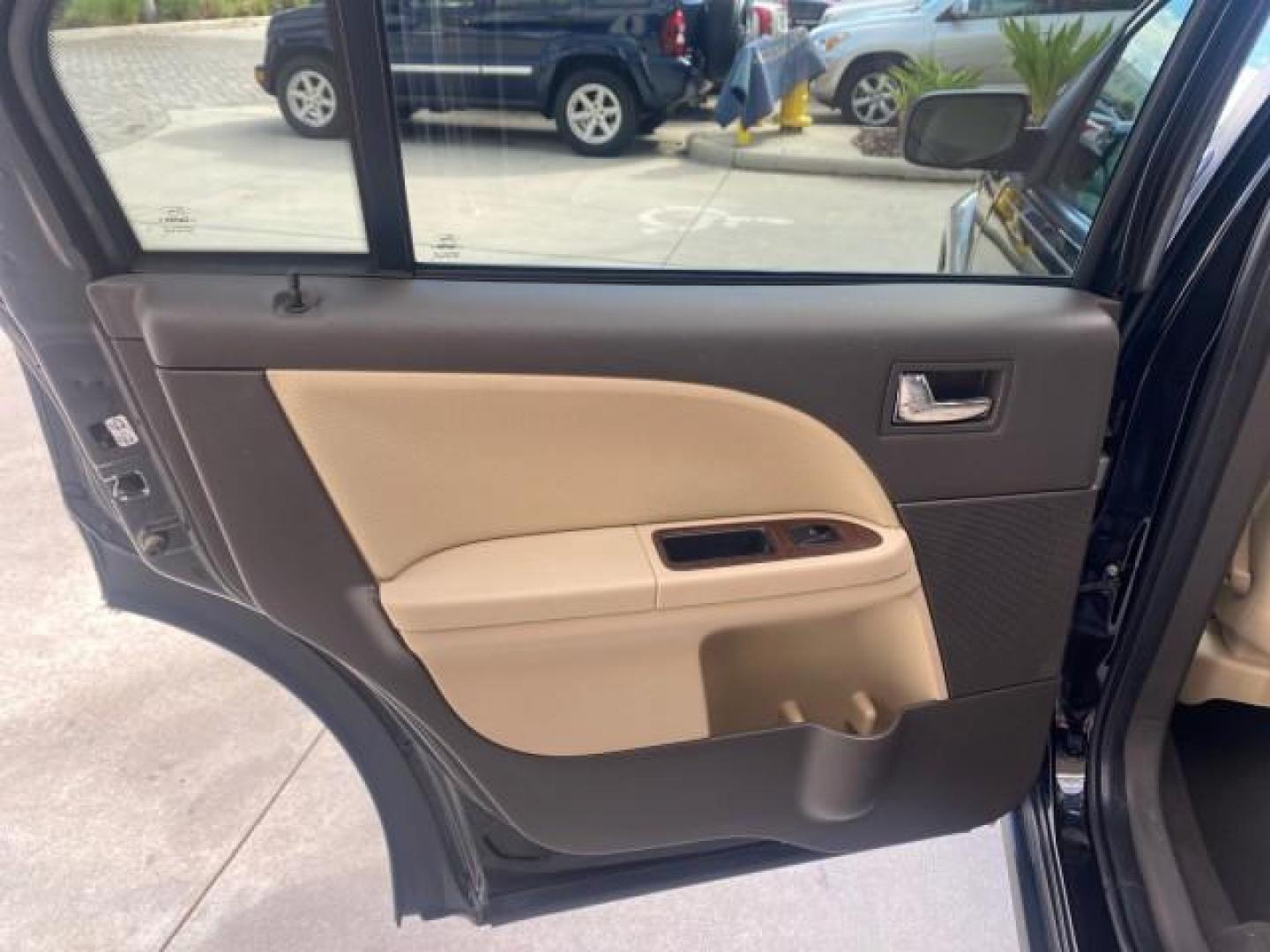 2008 Black /Camel Ford Taurus X Eddie Bauer LOW MILES 46,208 (1FMDK07W38G) with an 3.5L SMPI 24-Valve V6 Duratec Engine engine, Automatic transmission, located at 4701 North Dixie Hwy, Pompano Beach, FL, 33064, (954) 422-2889, 26.240938, -80.123474 - OUR WEBPAGE FLORIDACARS1.COM HAS OVER 100 PHOTOS AND FREE CARFAX LINK 2008 FORD TAURUS X EDDIE BAUER SUNROOF VIN: 1FMDK07W38GA10624 1 F M D K 0 7 W 3 8 G A 1 0 6 2 4 4 DOOR WAGON/SPORT UTILITY 3.5L V6 F GASOLINE FRONT WHEEL DRIVE Features ABS Brakes Air Conditioning Alloy Wheels AM/FM Stereo Automat - Photo#74