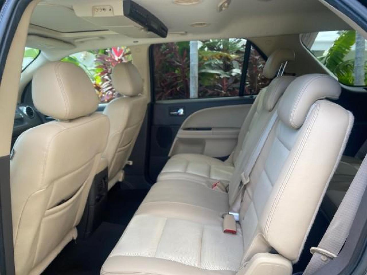 2008 Black /Camel Ford Taurus X Eddie Bauer LOW MILES 46,208 (1FMDK07W38G) with an 3.5L SMPI 24-Valve V6 Duratec Engine engine, Automatic transmission, located at 4701 North Dixie Hwy, Pompano Beach, FL, 33064, (954) 422-2889, 26.240938, -80.123474 - OUR WEBPAGE FLORIDACARS1.COM HAS OVER 100 PHOTOS AND FREE CARFAX LINK 2008 FORD TAURUS X EDDIE BAUER SUNROOF VIN: 1FMDK07W38GA10624 1 F M D K 0 7 W 3 8 G A 1 0 6 2 4 4 DOOR WAGON/SPORT UTILITY 3.5L V6 F GASOLINE FRONT WHEEL DRIVE Features ABS Brakes Air Conditioning Alloy Wheels AM/FM Stereo Automat - Photo#77