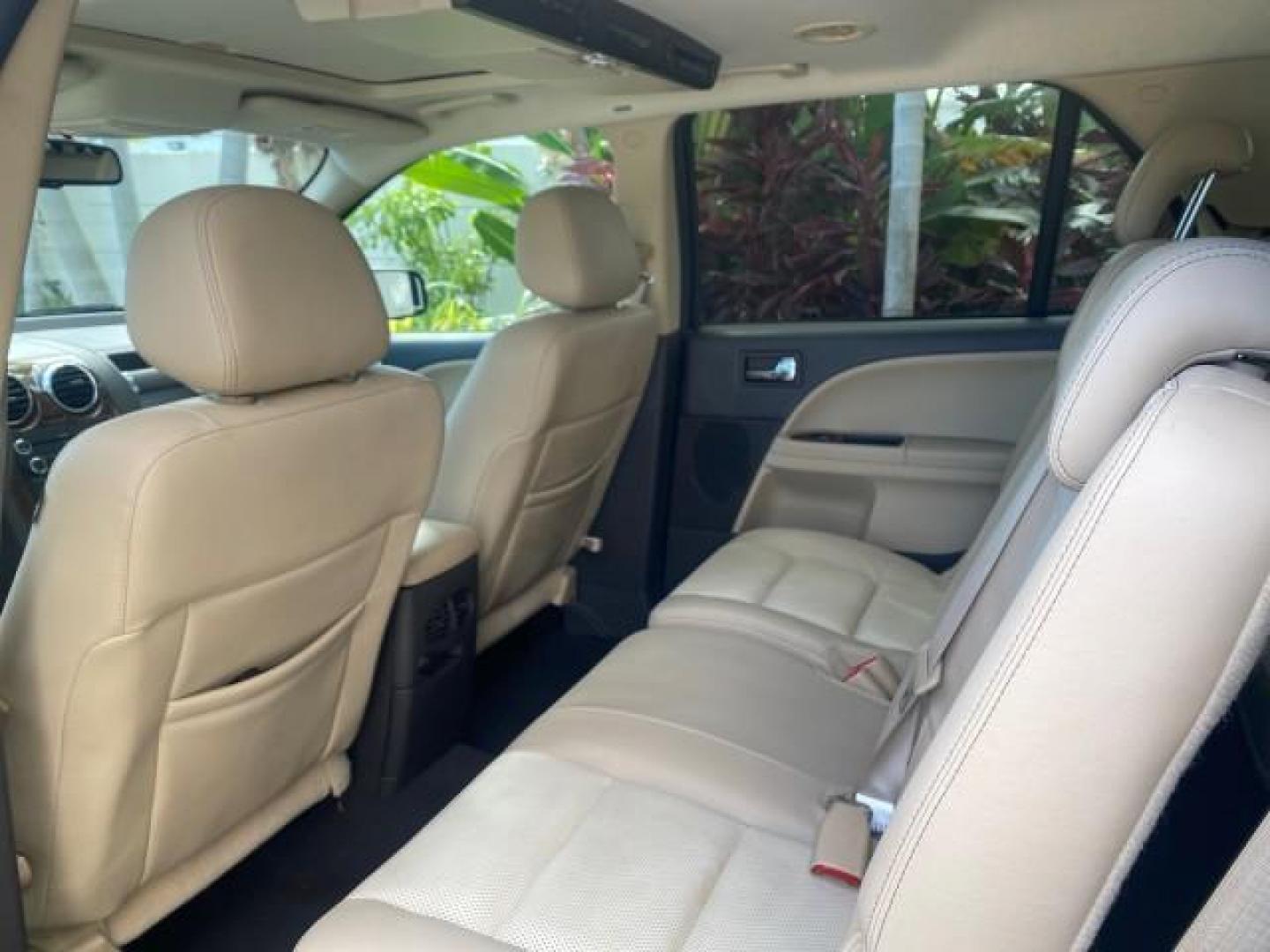 2008 Black /Camel Ford Taurus X Eddie Bauer LOW MILES 46,208 (1FMDK07W38G) with an 3.5L SMPI 24-Valve V6 Duratec Engine engine, Automatic transmission, located at 4701 North Dixie Hwy, Pompano Beach, FL, 33064, (954) 422-2889, 26.240938, -80.123474 - OUR WEBPAGE FLORIDACARS1.COM HAS OVER 100 PHOTOS AND FREE CARFAX LINK 2008 FORD TAURUS X EDDIE BAUER SUNROOF VIN: 1FMDK07W38GA10624 1 F M D K 0 7 W 3 8 G A 1 0 6 2 4 4 DOOR WAGON/SPORT UTILITY 3.5L V6 F GASOLINE FRONT WHEEL DRIVE Features ABS Brakes Air Conditioning Alloy Wheels AM/FM Stereo Automat - Photo#78