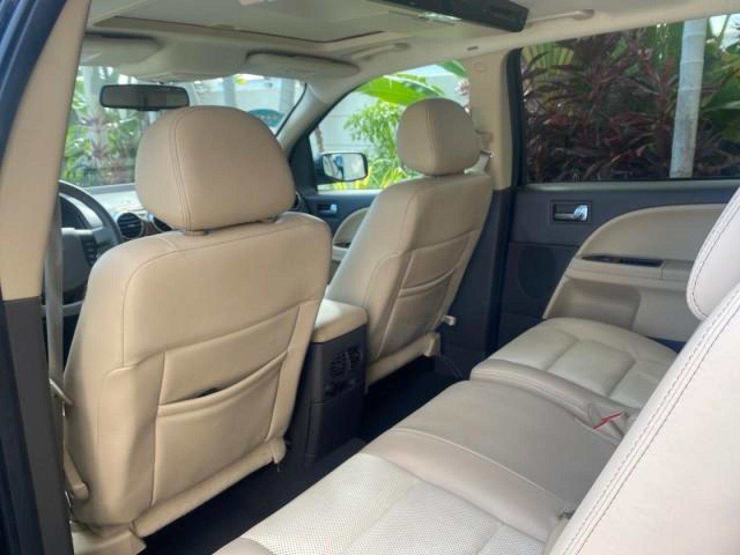 2008 Black /Camel Ford Taurus X Eddie Bauer LOW MILES 46,208 (1FMDK07W38G) with an 3.5L SMPI 24-Valve V6 Duratec Engine engine, Automatic transmission, located at 4701 North Dixie Hwy, Pompano Beach, FL, 33064, (954) 422-2889, 26.240938, -80.123474 - OUR WEBPAGE FLORIDACARS1.COM HAS OVER 100 PHOTOS AND FREE CARFAX LINK 2008 FORD TAURUS X EDDIE BAUER SUNROOF VIN: 1FMDK07W38GA10624 1 F M D K 0 7 W 3 8 G A 1 0 6 2 4 4 DOOR WAGON/SPORT UTILITY 3.5L V6 F GASOLINE FRONT WHEEL DRIVE Features ABS Brakes Air Conditioning Alloy Wheels AM/FM Stereo Automat - Photo#79