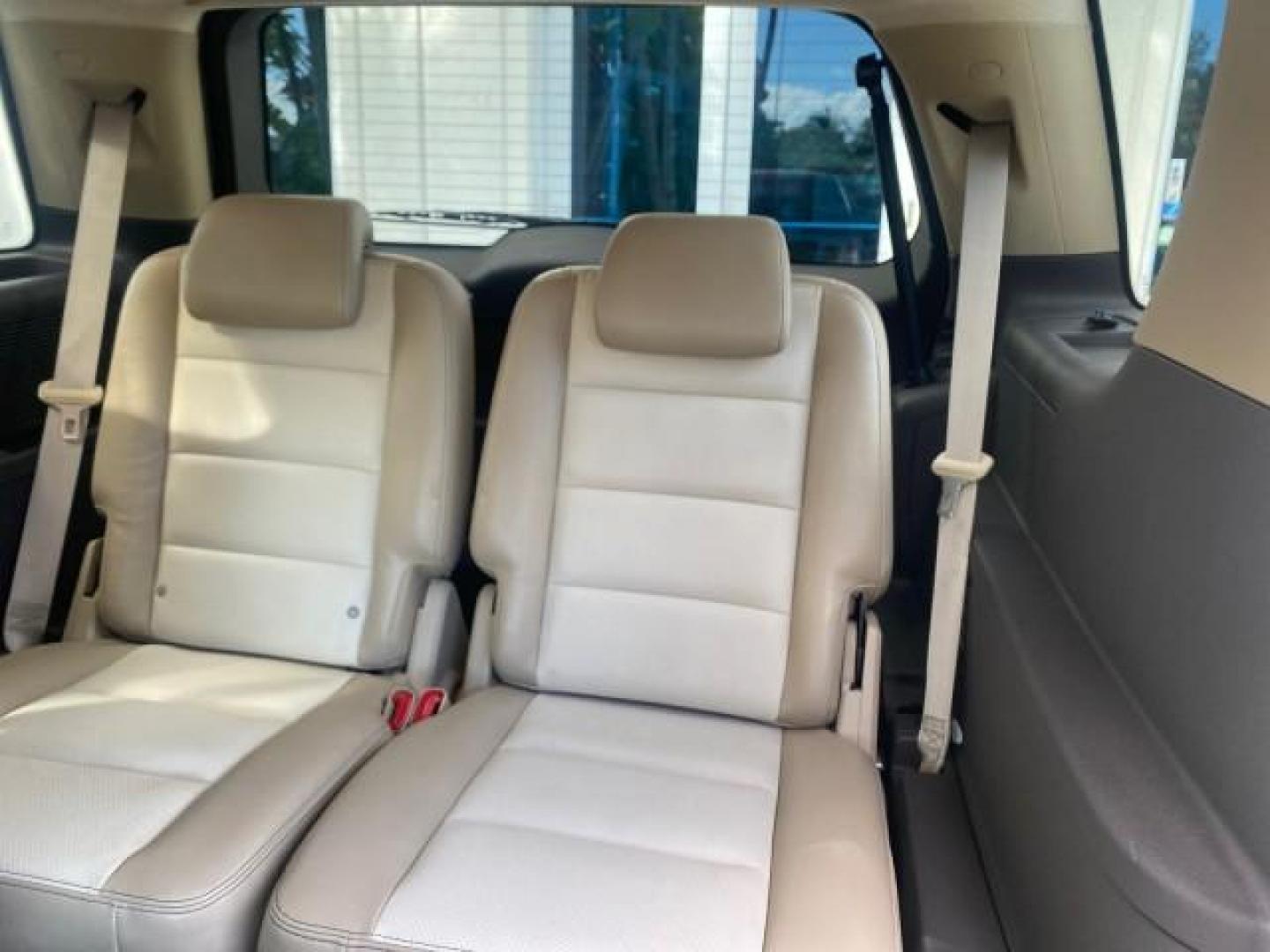 2008 Black /Camel Ford Taurus X Eddie Bauer LOW MILES 46,208 (1FMDK07W38G) with an 3.5L SMPI 24-Valve V6 Duratec Engine engine, Automatic transmission, located at 4701 North Dixie Hwy, Pompano Beach, FL, 33064, (954) 422-2889, 26.240938, -80.123474 - OUR WEBPAGE FLORIDACARS1.COM HAS OVER 100 PHOTOS AND FREE CARFAX LINK 2008 FORD TAURUS X EDDIE BAUER SUNROOF VIN: 1FMDK07W38GA10624 1 F M D K 0 7 W 3 8 G A 1 0 6 2 4 4 DOOR WAGON/SPORT UTILITY 3.5L V6 F GASOLINE FRONT WHEEL DRIVE Features ABS Brakes Air Conditioning Alloy Wheels AM/FM Stereo Automat - Photo#90