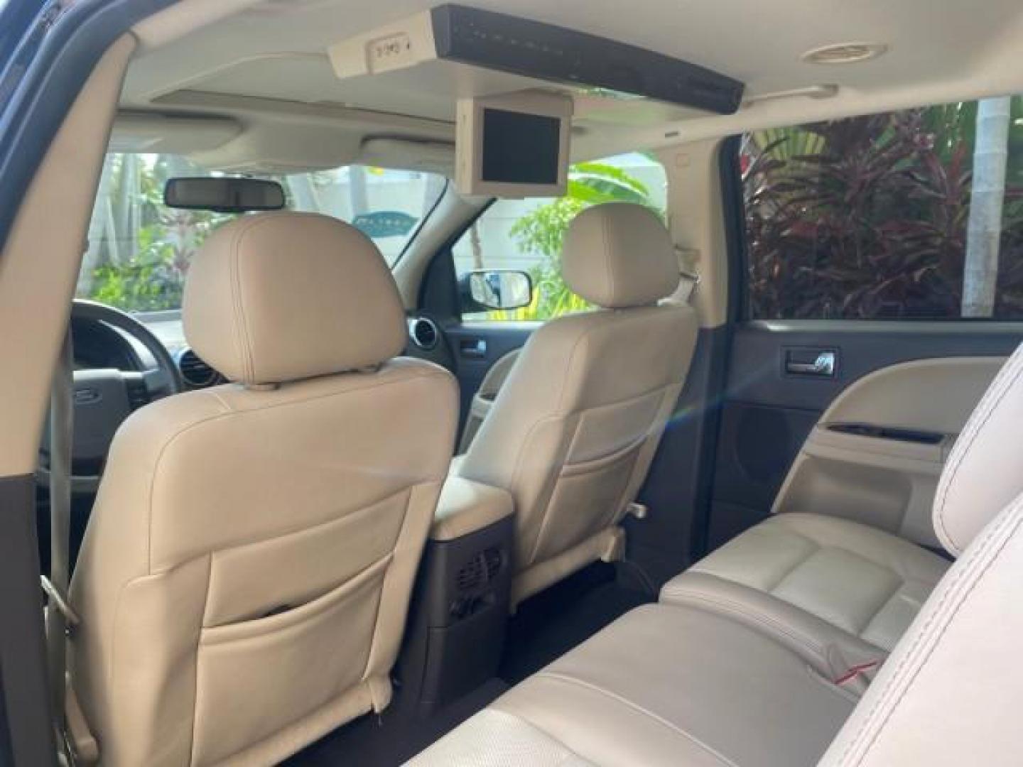 2008 Black /Camel Ford Taurus X Eddie Bauer LOW MILES 46,208 (1FMDK07W38G) with an 3.5L SMPI 24-Valve V6 Duratec Engine engine, Automatic transmission, located at 4701 North Dixie Hwy, Pompano Beach, FL, 33064, (954) 422-2889, 26.240938, -80.123474 - OUR WEBPAGE FLORIDACARS1.COM HAS OVER 100 PHOTOS AND FREE CARFAX LINK 2008 FORD TAURUS X EDDIE BAUER SUNROOF VIN: 1FMDK07W38GA10624 1 F M D K 0 7 W 3 8 G A 1 0 6 2 4 4 DOOR WAGON/SPORT UTILITY 3.5L V6 F GASOLINE FRONT WHEEL DRIVE Features ABS Brakes Air Conditioning Alloy Wheels AM/FM Stereo Automat - Photo#91