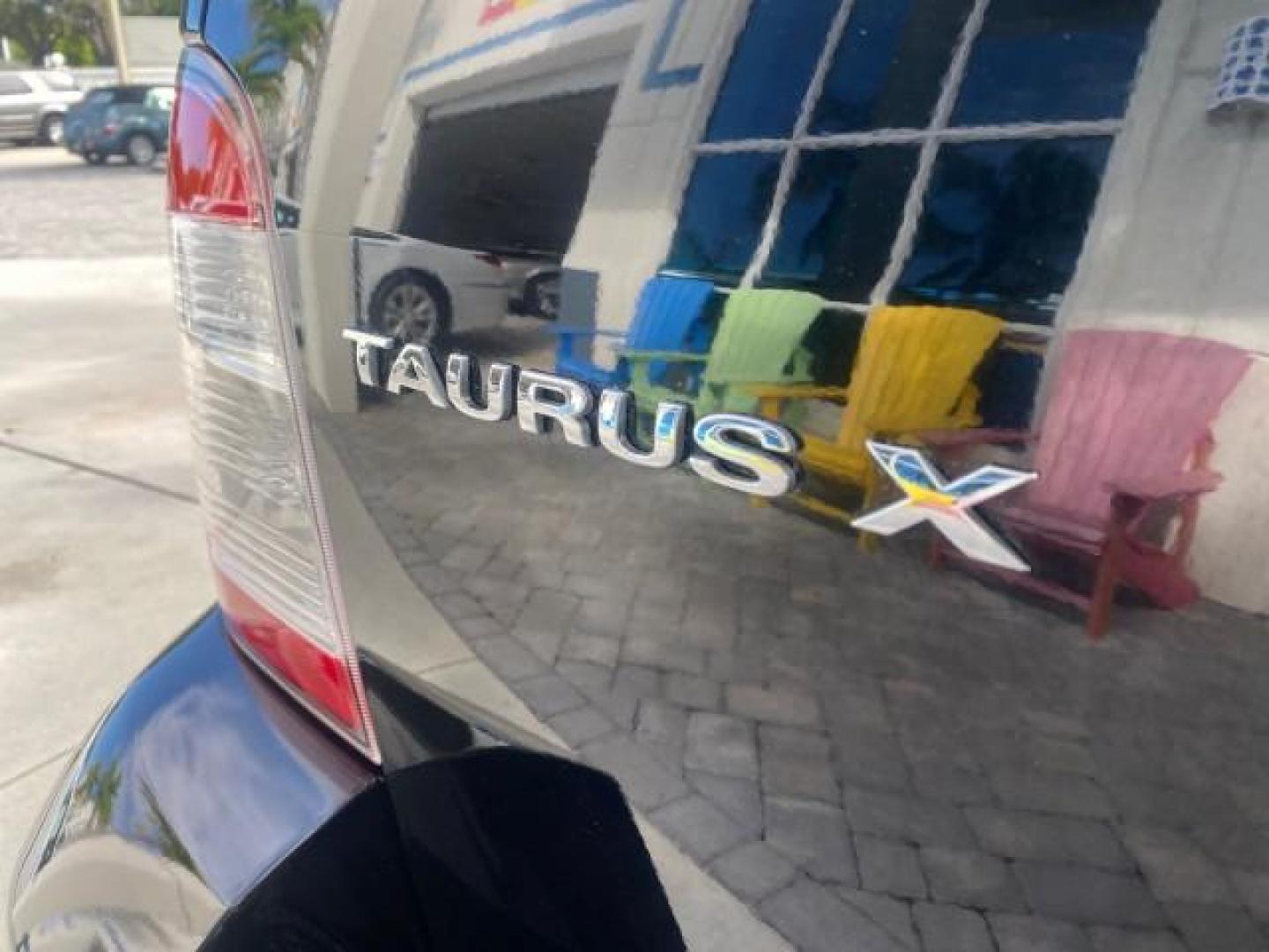 2008 Black /Camel Ford Taurus X Eddie Bauer LOW MILES 46,208 (1FMDK07W38G) with an 3.5L SMPI 24-Valve V6 Duratec Engine engine, Automatic transmission, located at 4701 North Dixie Hwy, Pompano Beach, FL, 33064, (954) 422-2889, 26.240938, -80.123474 - OUR WEBPAGE FLORIDACARS1.COM HAS OVER 100 PHOTOS AND FREE CARFAX LINK 2008 FORD TAURUS X EDDIE BAUER SUNROOF VIN: 1FMDK07W38GA10624 1 F M D K 0 7 W 3 8 G A 1 0 6 2 4 4 DOOR WAGON/SPORT UTILITY 3.5L V6 F GASOLINE FRONT WHEEL DRIVE Features ABS Brakes Air Conditioning Alloy Wheels AM/FM Stereo Automat - Photo#97