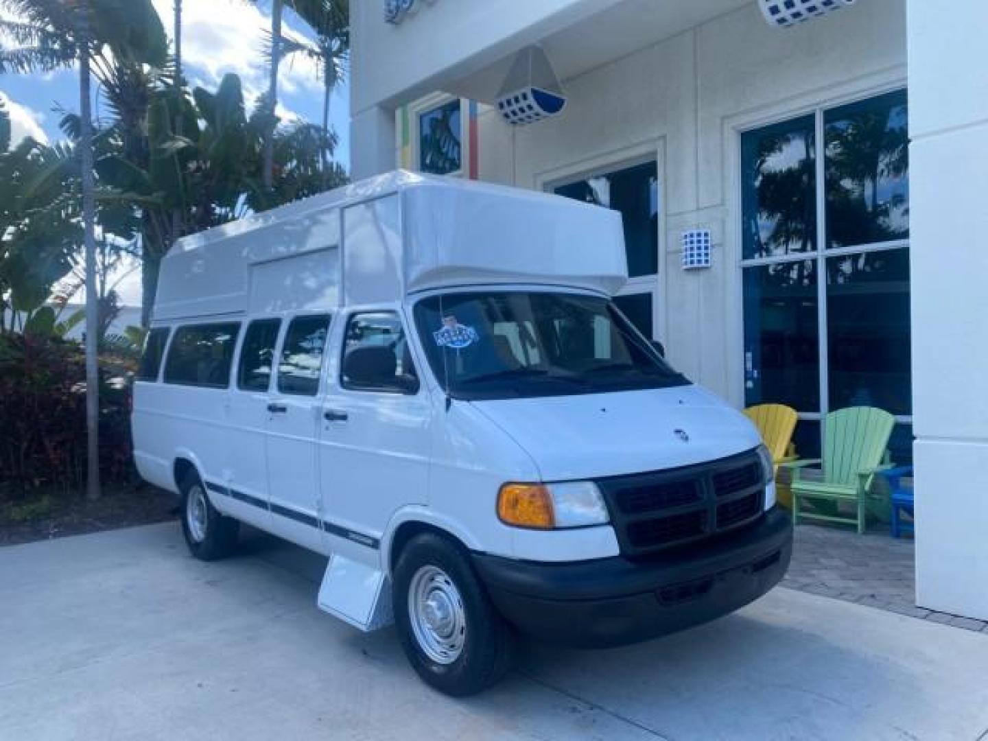 2002 Bright White /Dark Slate Gray Dodge Ram Van LOW MILES 61,263 HIGH TOP CONVERSION (2B7LB31Z42K) with an 5.9L MPI V8 Magnum Engine engine, Automatic transmission, located at 4701 North Dixie Hwy, Pompano Beach, FL, 33064, (954) 422-2889, 26.240938, -80.123474 - OUR WEBPAGE FLORIDACARS1.COM HAS OVER 100 PHOTOS AND FREE CARFAX LINK 2002 DODGE RAM VAN 3500 MAXI EXTENDED HIGH TOP 11 SEATER HANDICAP LIFT VIN: 2B7LB31Z42K117751 2 B 7 L B 3 1 Z 4 2 K 1 1 7 7 5 1 VAN 5.9L V8 F OHV 16V GASOLINE REAR WHEEL DRIVE Features ABS Brakes Air Conditioning AM/FM Stereo Auto - Photo#1
