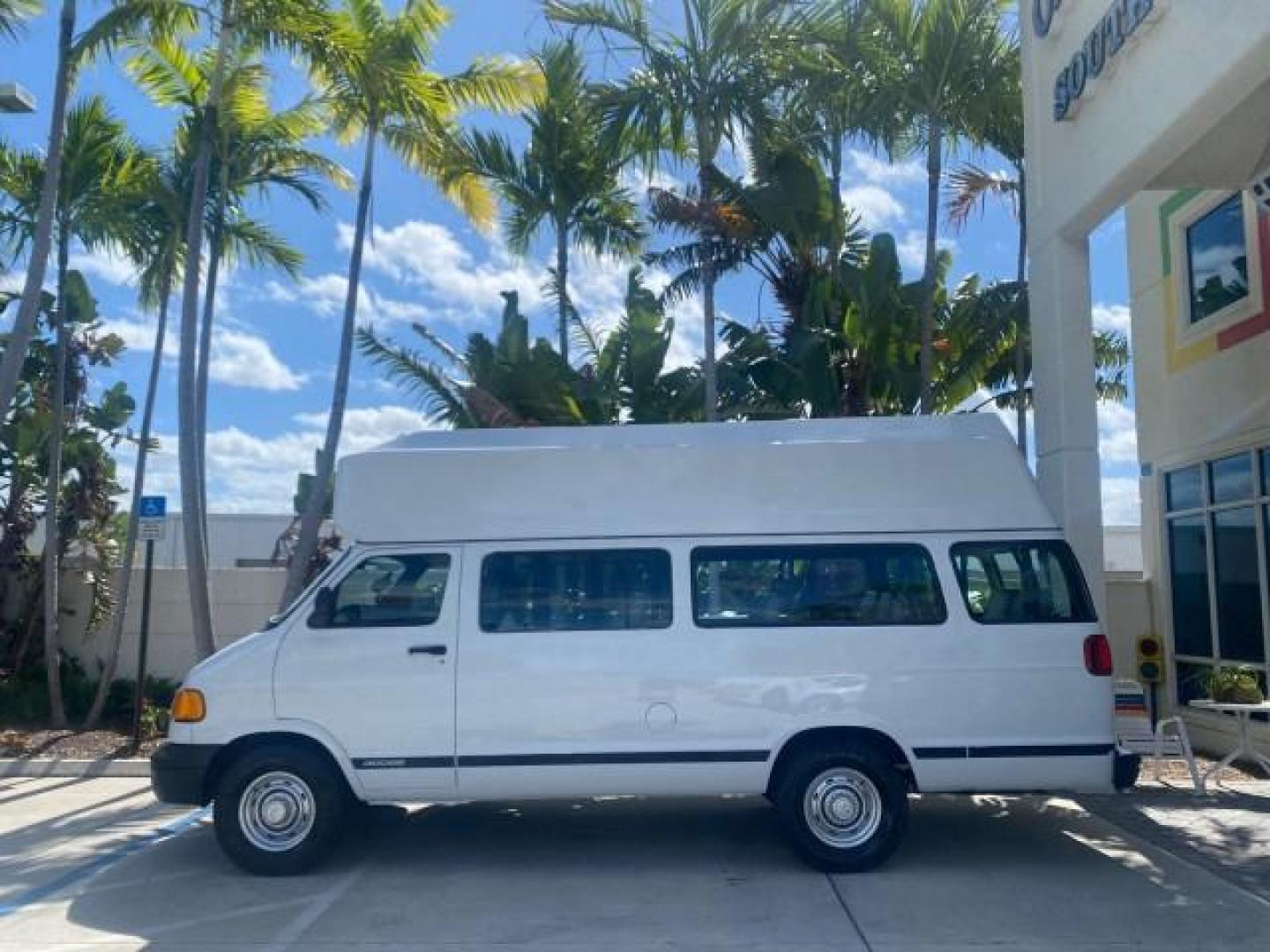 2002 Bright White /Dark Slate Gray Dodge Ram Van LOW MILES 61,263 HIGH TOP CONVERSION (2B7LB31Z42K) with an 5.9L MPI V8 Magnum Engine engine, Automatic transmission, located at 4701 North Dixie Hwy, Pompano Beach, FL, 33064, (954) 422-2889, 26.240938, -80.123474 - OUR WEBPAGE FLORIDACARS1.COM HAS OVER 100 PHOTOS AND FREE CARFAX LINK 2002 DODGE RAM VAN 3500 MAXI EXTENDED HIGH TOP 11 SEATER HANDICAP LIFT VIN: 2B7LB31Z42K117751 2 B 7 L B 3 1 Z 4 2 K 1 1 7 7 5 1 VAN 5.9L V8 F OHV 16V GASOLINE REAR WHEEL DRIVE Features ABS Brakes Air Conditioning AM/FM Stereo Auto - Photo#4