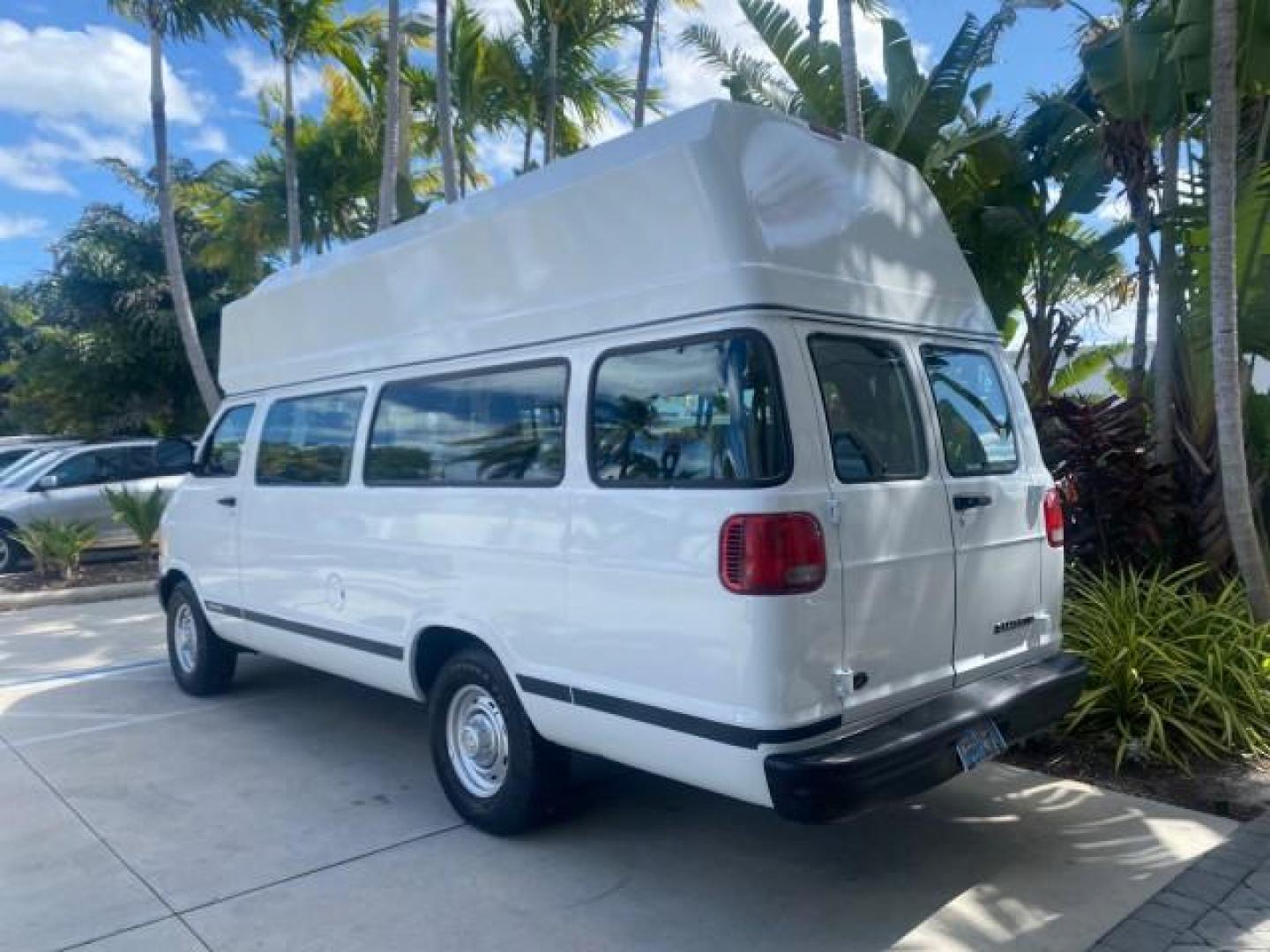 2002 Bright White /Dark Slate Gray Dodge Ram Van LOW MILES 61,263 HIGH TOP CONVERSION (2B7LB31Z42K) with an 5.9L MPI V8 Magnum Engine engine, Automatic transmission, located at 4701 North Dixie Hwy, Pompano Beach, FL, 33064, (954) 422-2889, 26.240938, -80.123474 - OUR WEBPAGE FLORIDACARS1.COM HAS OVER 100 PHOTOS AND FREE CARFAX LINK 2002 DODGE RAM VAN 3500 MAXI EXTENDED HIGH TOP 11 SEATER HANDICAP LIFT VIN: 2B7LB31Z42K117751 2 B 7 L B 3 1 Z 4 2 K 1 1 7 7 5 1 VAN 5.9L V8 F OHV 16V GASOLINE REAR WHEEL DRIVE Features ABS Brakes Air Conditioning AM/FM Stereo Auto - Photo#5