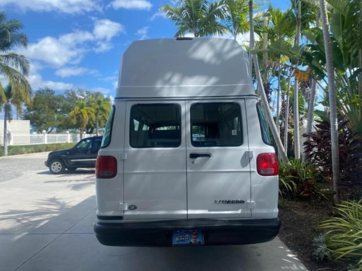 2002 Bright White /Dark Slate Gray Dodge Ram Van LOW MILES 61,263 HIGH TOP CONVERSION (2B7LB31Z42K) with an 5.9L MPI V8 Magnum Engine engine, Automatic transmission, located at 4701 North Dixie Hwy, Pompano Beach, FL, 33064, (954) 422-2889, 26.240938, -80.123474 - OUR WEBPAGE FLORIDACARS1.COM HAS OVER 100 PHOTOS AND FREE CARFAX LINK 2002 DODGE RAM VAN 3500 MAXI EXTENDED HIGH TOP 11 SEATER HANDICAP LIFT VIN: 2B7LB31Z42K117751 2 B 7 L B 3 1 Z 4 2 K 1 1 7 7 5 1 VAN 5.9L V8 F OHV 16V GASOLINE REAR WHEEL DRIVE Features ABS Brakes Air Conditioning AM/FM Stereo Auto - Photo#6