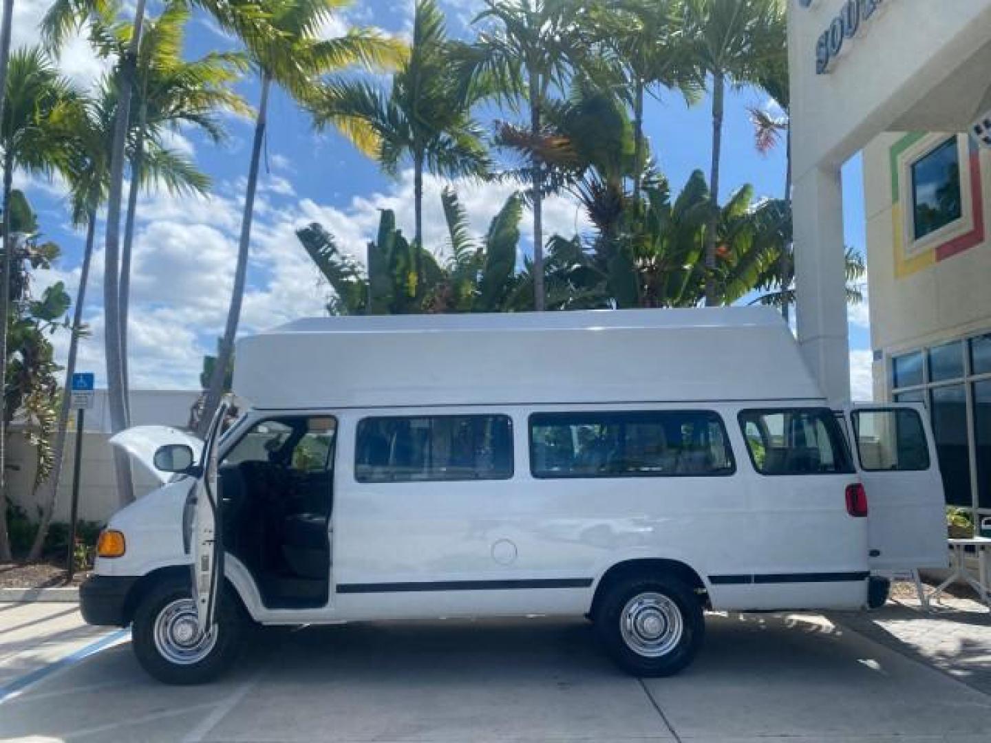 2002 Bright White /Dark Slate Gray Dodge Ram Van LOW MILES 61,263 HIGH TOP CONVERSION (2B7LB31Z42K) with an 5.9L MPI V8 Magnum Engine engine, Automatic transmission, located at 4701 North Dixie Hwy, Pompano Beach, FL, 33064, (954) 422-2889, 26.240938, -80.123474 - OUR WEBPAGE FLORIDACARS1.COM HAS OVER 100 PHOTOS AND FREE CARFAX LINK 2002 DODGE RAM VAN 3500 MAXI EXTENDED HIGH TOP 11 SEATER HANDICAP LIFT VIN: 2B7LB31Z42K117751 2 B 7 L B 3 1 Z 4 2 K 1 1 7 7 5 1 VAN 5.9L V8 F OHV 16V GASOLINE REAR WHEEL DRIVE Features ABS Brakes Air Conditioning AM/FM Stereo Auto - Photo#8
