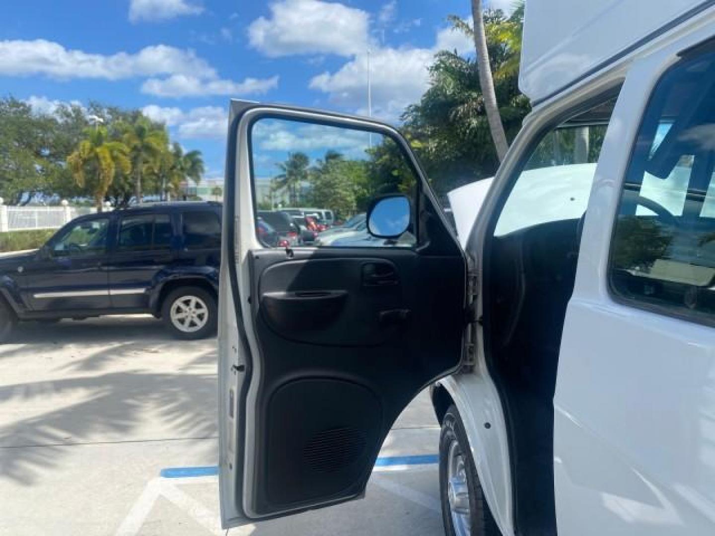 2002 Bright White /Dark Slate Gray Dodge Ram Van LOW MILES 61,263 HIGH TOP CONVERSION (2B7LB31Z42K) with an 5.9L MPI V8 Magnum Engine engine, Automatic transmission, located at 4701 North Dixie Hwy, Pompano Beach, FL, 33064, (954) 422-2889, 26.240938, -80.123474 - OUR WEBPAGE FLORIDACARS1.COM HAS OVER 100 PHOTOS AND FREE CARFAX LINK 2002 DODGE RAM VAN 3500 MAXI EXTENDED HIGH TOP 11 SEATER HANDICAP LIFT VIN: 2B7LB31Z42K117751 2 B 7 L B 3 1 Z 4 2 K 1 1 7 7 5 1 VAN 5.9L V8 F OHV 16V GASOLINE REAR WHEEL DRIVE Features ABS Brakes Air Conditioning AM/FM Stereo Auto - Photo#9