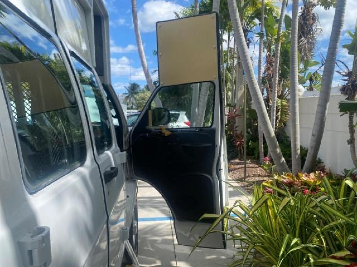 2002 Bright White /Dark Slate Gray Dodge Ram Van LOW MILES 61,263 HIGH TOP CONVERSION (2B7LB31Z42K) with an 5.9L MPI V8 Magnum Engine engine, Automatic transmission, located at 4701 North Dixie Hwy, Pompano Beach, FL, 33064, (954) 422-2889, 26.240938, -80.123474 - OUR WEBPAGE FLORIDACARS1.COM HAS OVER 100 PHOTOS AND FREE CARFAX LINK 2002 DODGE RAM VAN 3500 MAXI EXTENDED HIGH TOP 11 SEATER HANDICAP LIFT VIN: 2B7LB31Z42K117751 2 B 7 L B 3 1 Z 4 2 K 1 1 7 7 5 1 VAN 5.9L V8 F OHV 16V GASOLINE REAR WHEEL DRIVE Features ABS Brakes Air Conditioning AM/FM Stereo Auto - Photo#11