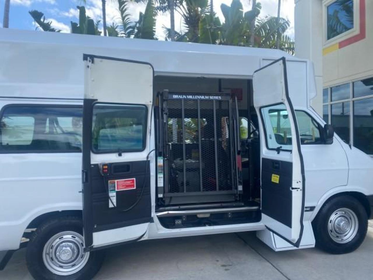 2002 Bright White /Dark Slate Gray Dodge Ram Van LOW MILES 61,263 HIGH TOP CONVERSION (2B7LB31Z42K) with an 5.9L MPI V8 Magnum Engine engine, Automatic transmission, located at 4701 North Dixie Hwy, Pompano Beach, FL, 33064, (954) 422-2889, 26.240938, -80.123474 - OUR WEBPAGE FLORIDACARS1.COM HAS OVER 100 PHOTOS AND FREE CARFAX LINK 2002 DODGE RAM VAN 3500 MAXI EXTENDED HIGH TOP 11 SEATER HANDICAP LIFT VIN: 2B7LB31Z42K117751 2 B 7 L B 3 1 Z 4 2 K 1 1 7 7 5 1 VAN 5.9L V8 F OHV 16V GASOLINE REAR WHEEL DRIVE Features ABS Brakes Air Conditioning AM/FM Stereo Auto - Photo#13