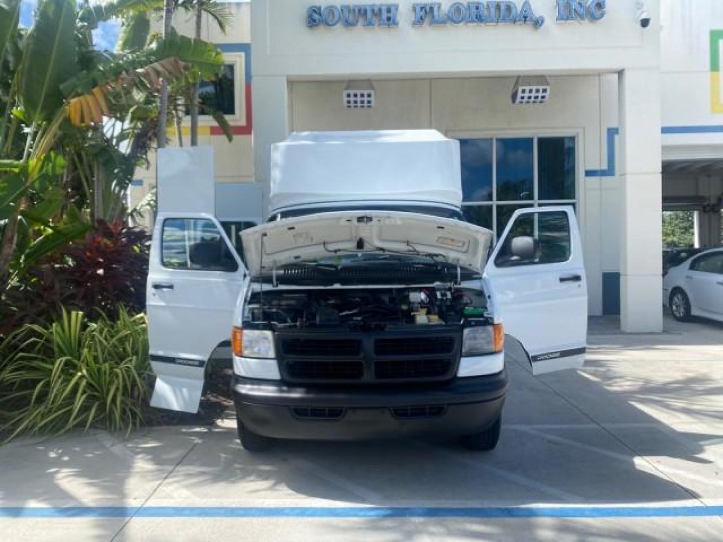 2002 Bright White /Dark Slate Gray Dodge Ram Van LOW MILES 61,263 HIGH TOP CONVERSION (2B7LB31Z42K) with an 5.9L MPI V8 Magnum Engine engine, Automatic transmission, located at 4701 North Dixie Hwy, Pompano Beach, FL, 33064, (954) 422-2889, 26.240938, -80.123474 - OUR WEBPAGE FLORIDACARS1.COM HAS OVER 100 PHOTOS AND FREE CARFAX LINK 2002 DODGE RAM VAN 3500 MAXI EXTENDED HIGH TOP 11 SEATER HANDICAP LIFT VIN: 2B7LB31Z42K117751 2 B 7 L B 3 1 Z 4 2 K 1 1 7 7 5 1 VAN 5.9L V8 F OHV 16V GASOLINE REAR WHEEL DRIVE Features ABS Brakes Air Conditioning AM/FM Stereo Auto - Photo#16